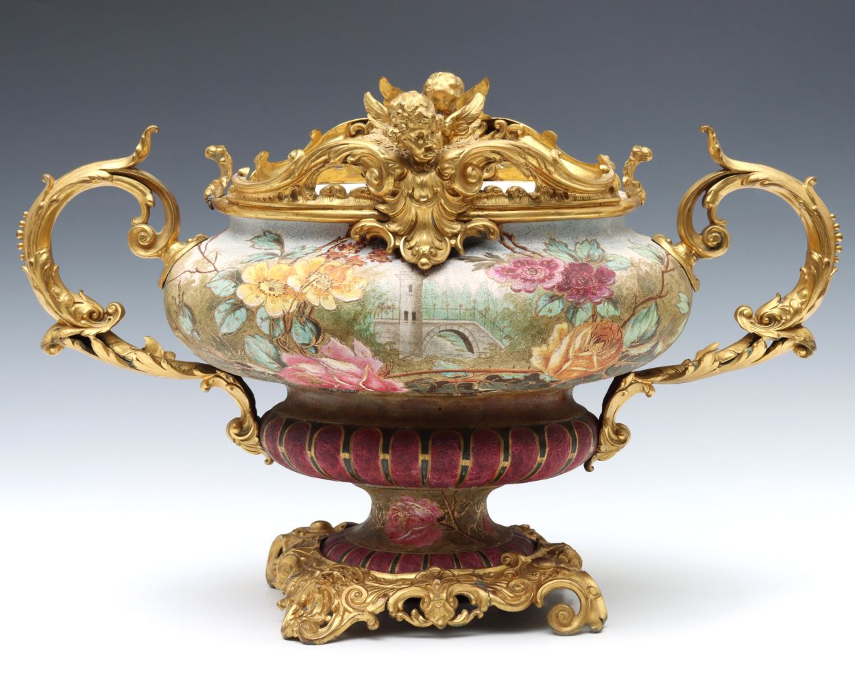 A 19TH C. CONTINENTAL POTTERY URN IN FINE ORMOLU MOUNTS