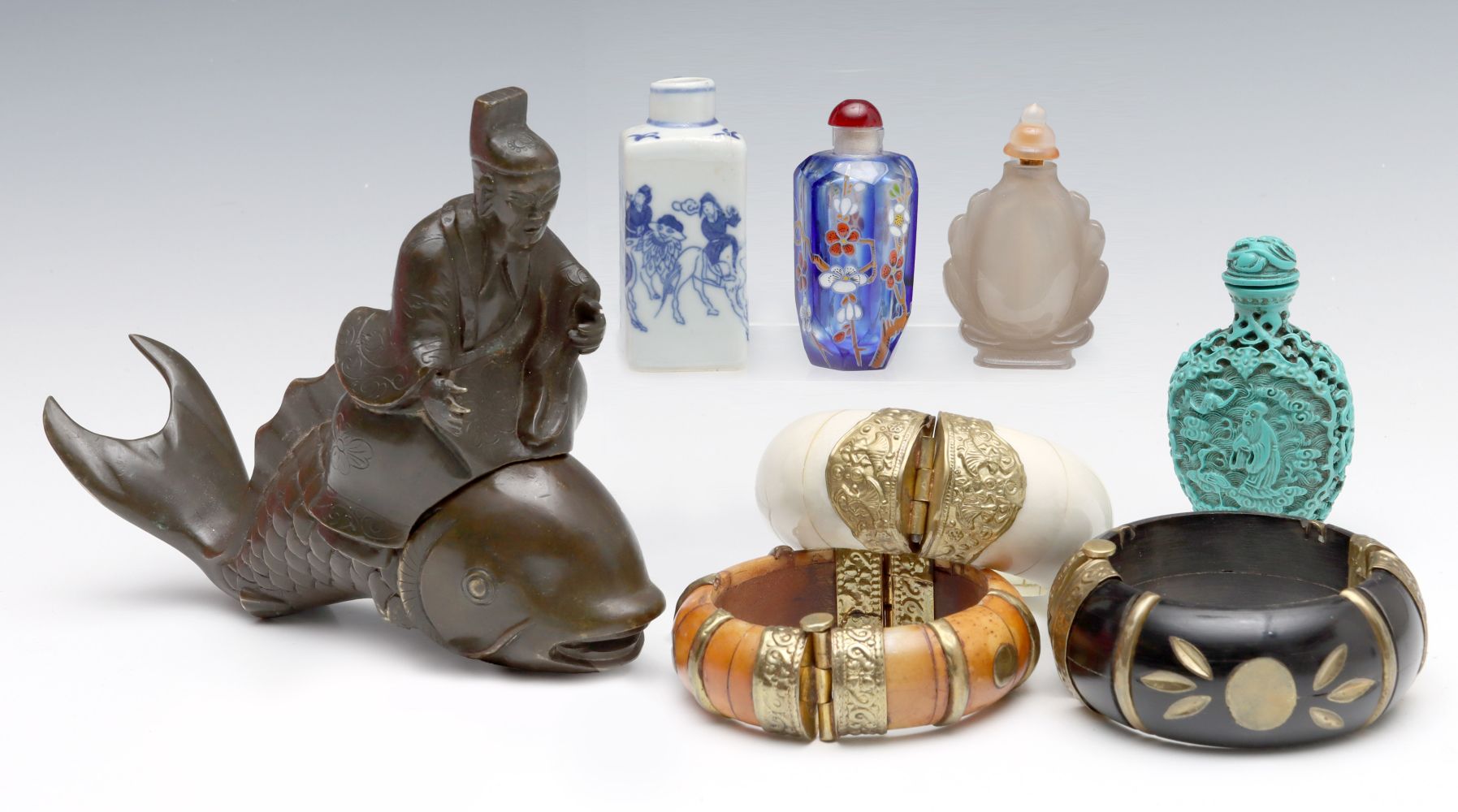 A COLLECTION THIRTEEN MODERN ASIAN DECORATIVE OBJECTS