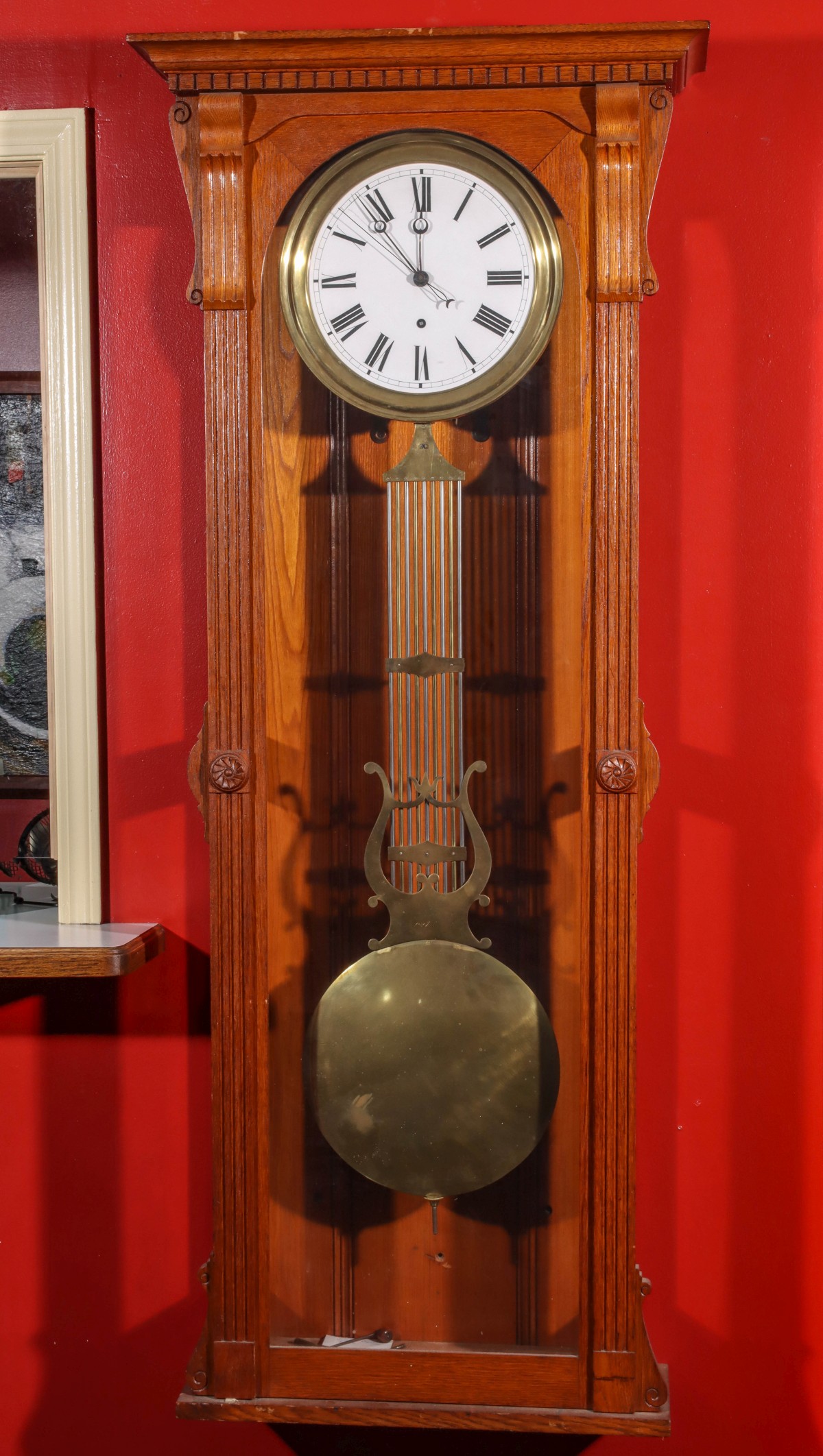 A LATE 19TH CENTURY JEWELER'S REGULATOR IN OAK CASE