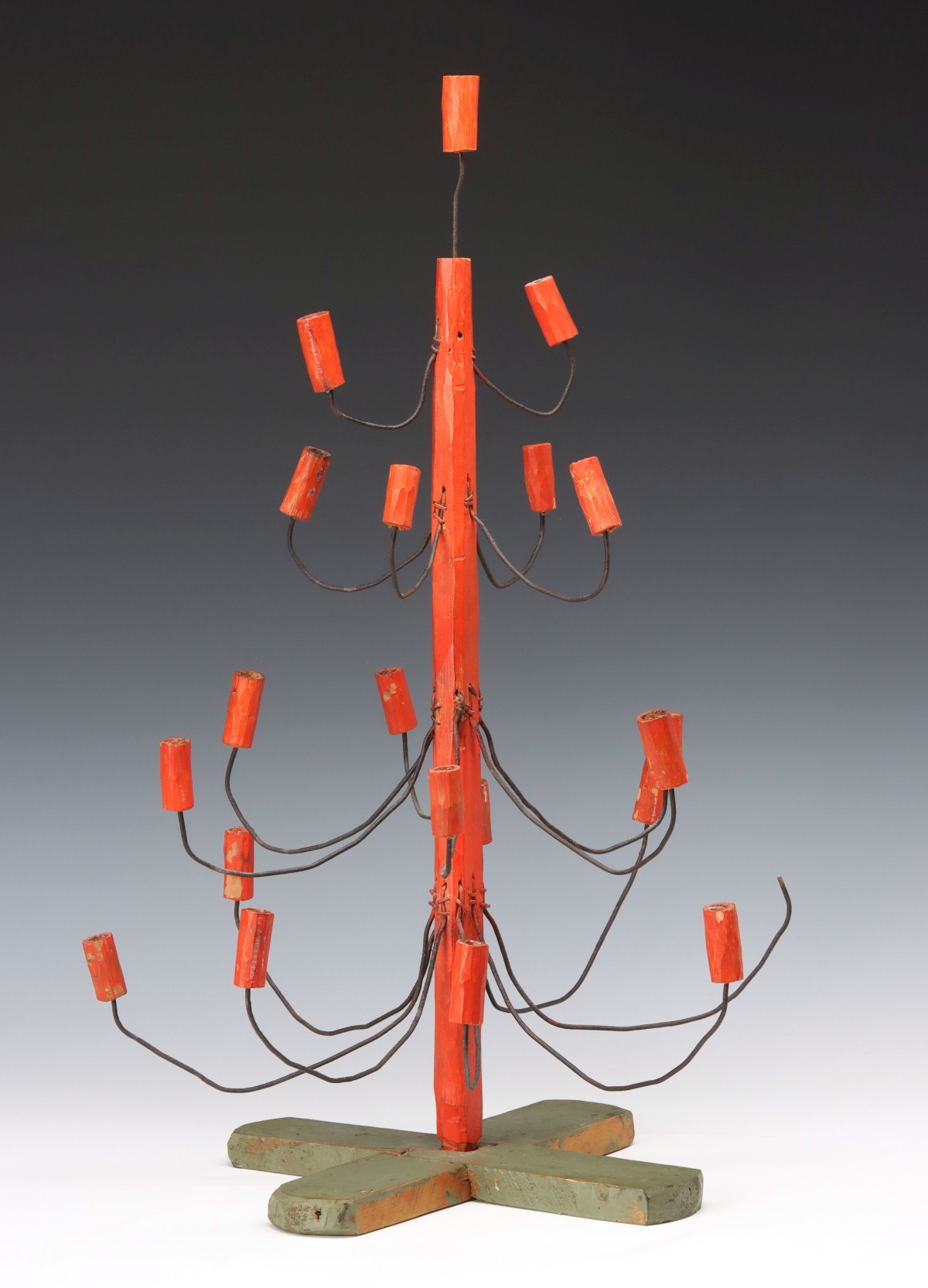 A CARVED AND PAINTED WOOD FOLK ART CHRISTMAS TREE