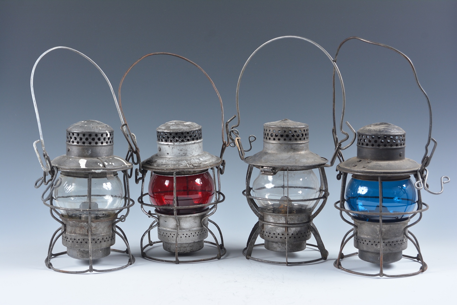 FOUR SHORT GLOBE LANTERNS WITH RAILROAD MARKINGS