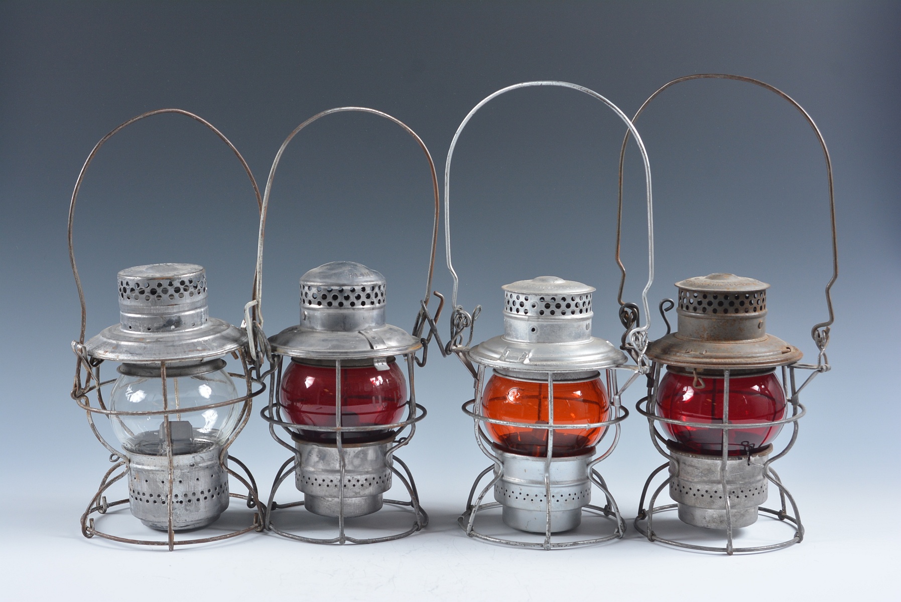 FOUR SHORT GLOBE LANTERNS WITH RAILROAD MARKINGS