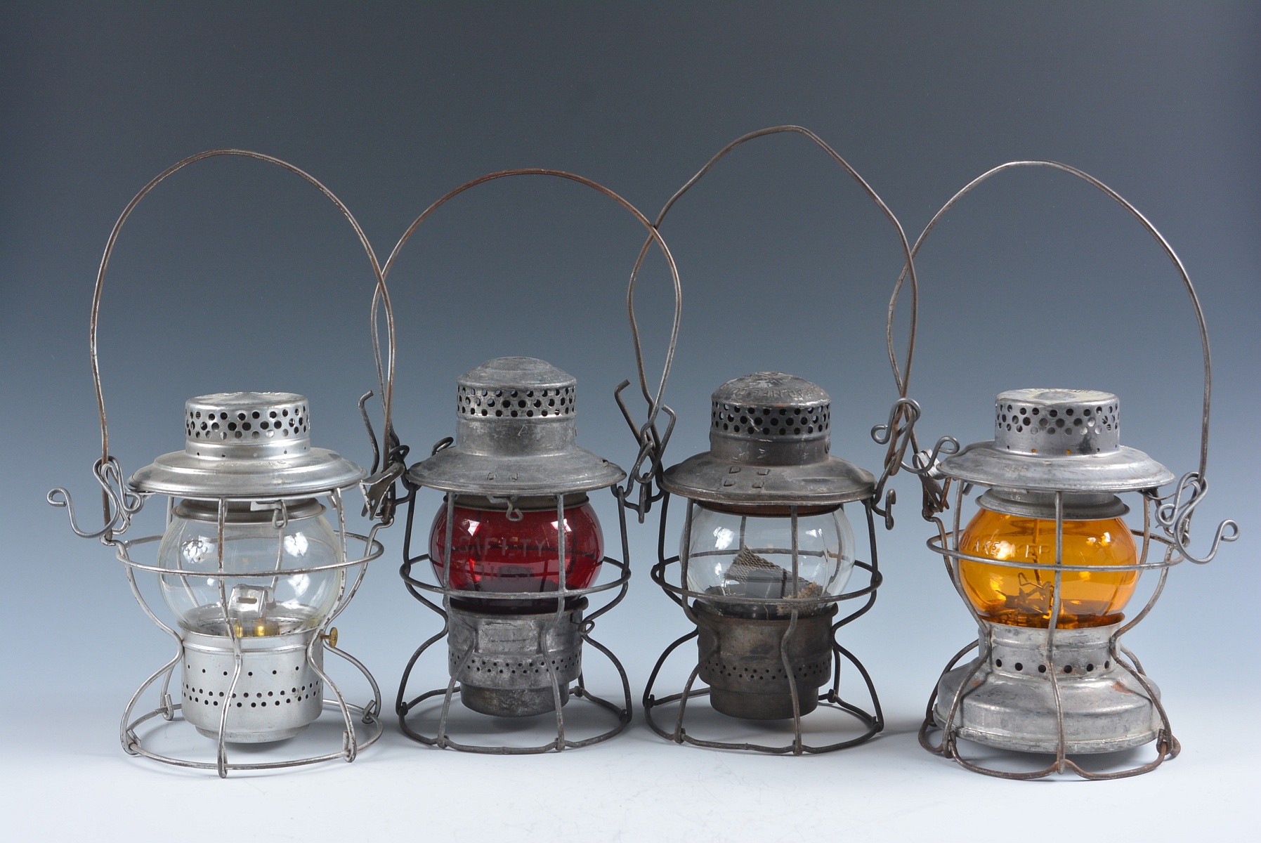 FOUR SHORT GLOBE LANTERNS WITH RAILROAD MARKINGS