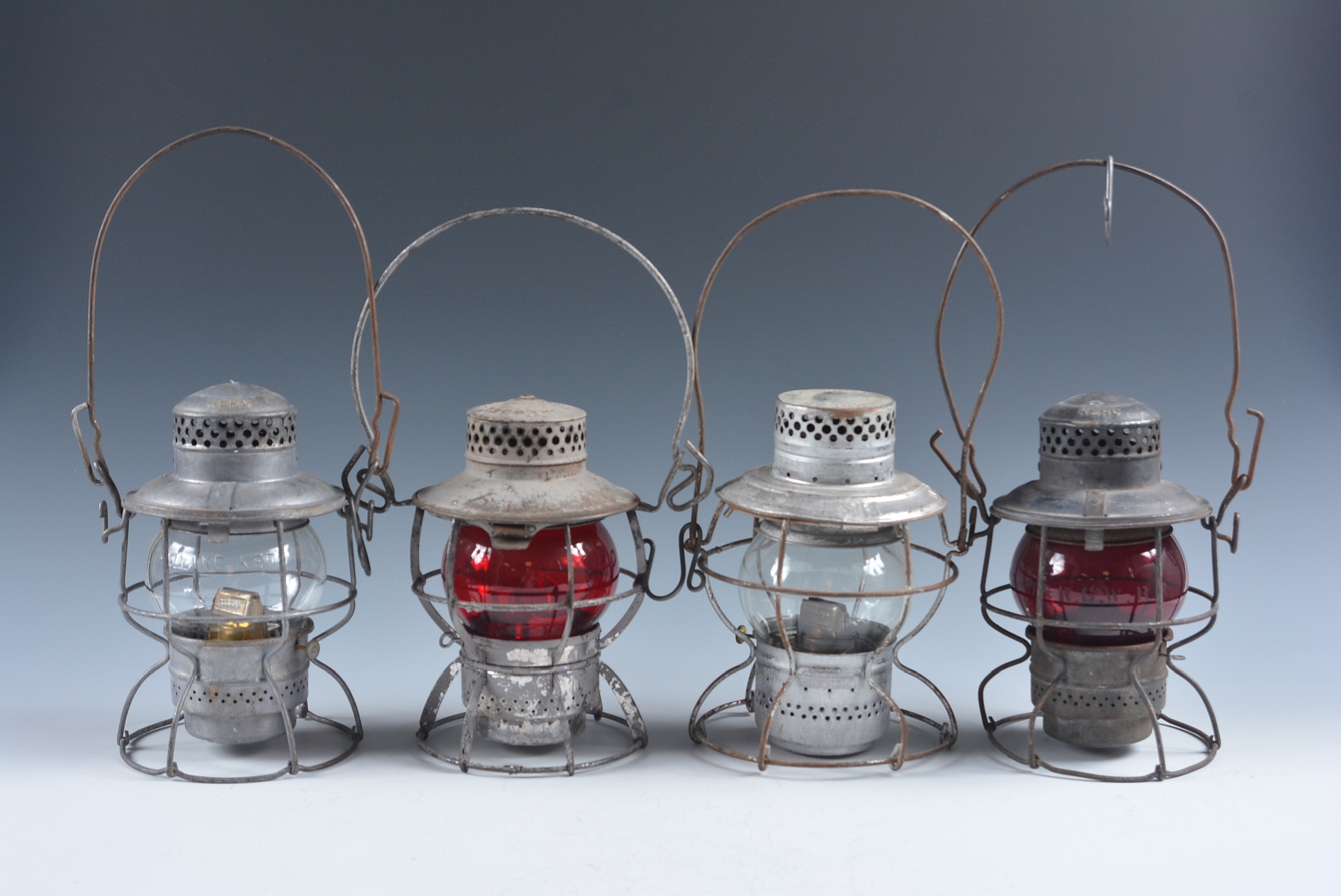 FOUR SHORT GLOBE LANTERNS WITH RAILROAD MARKINGS