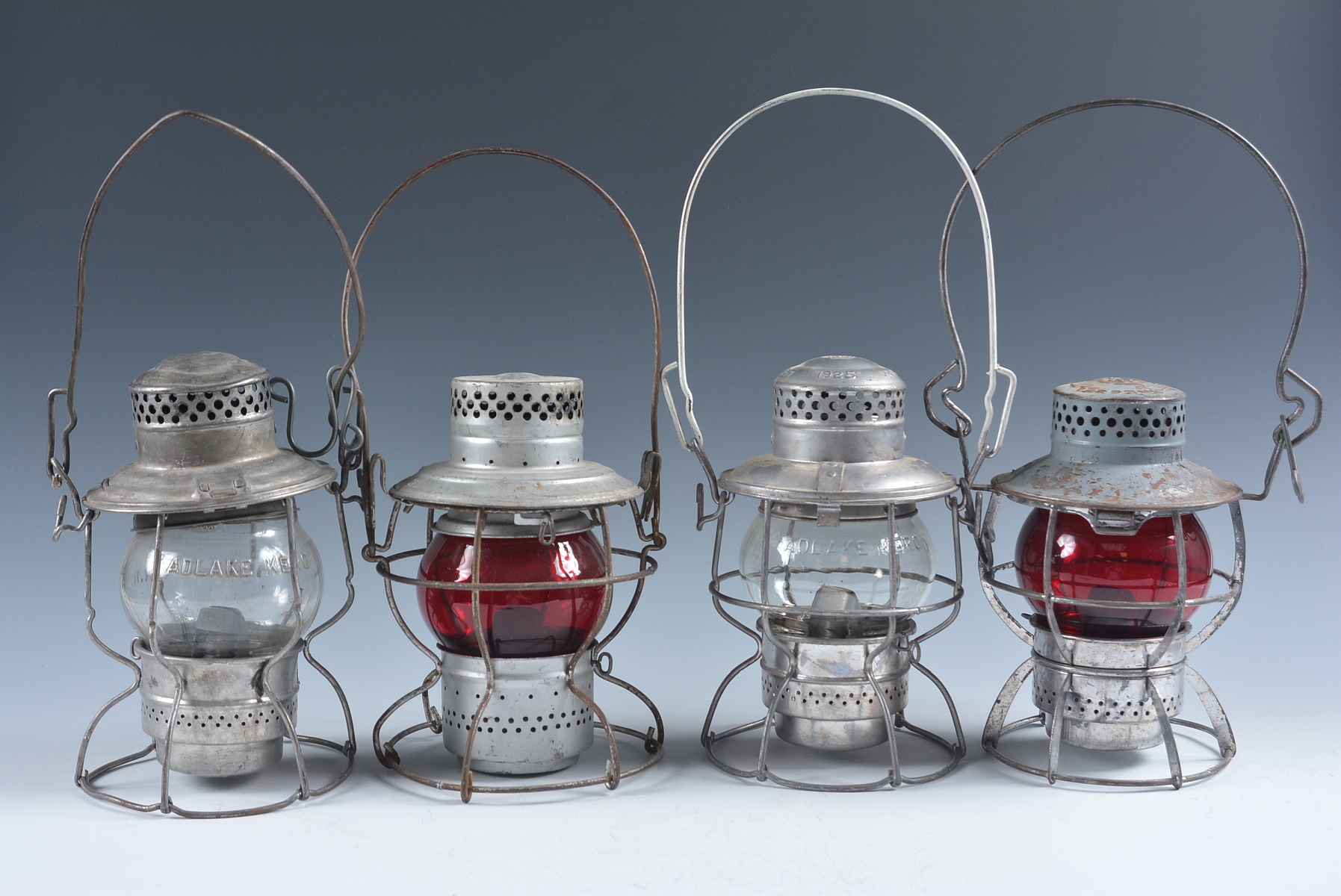 FOUR SHORT GLOBE LANTERNS WITH RAILROAD MARKINGS