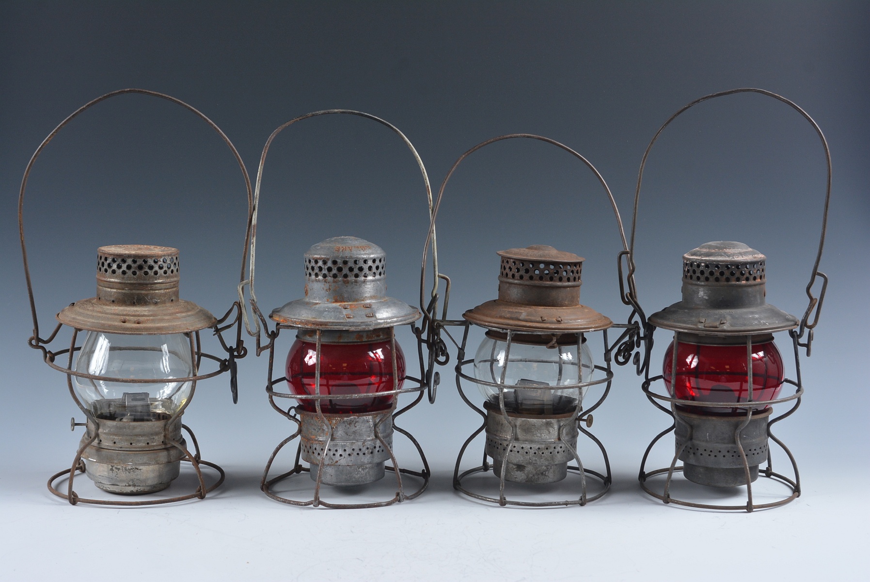 FOUR SHORT GLOBE LANTERNS WITH RAILROAD MARKINGS