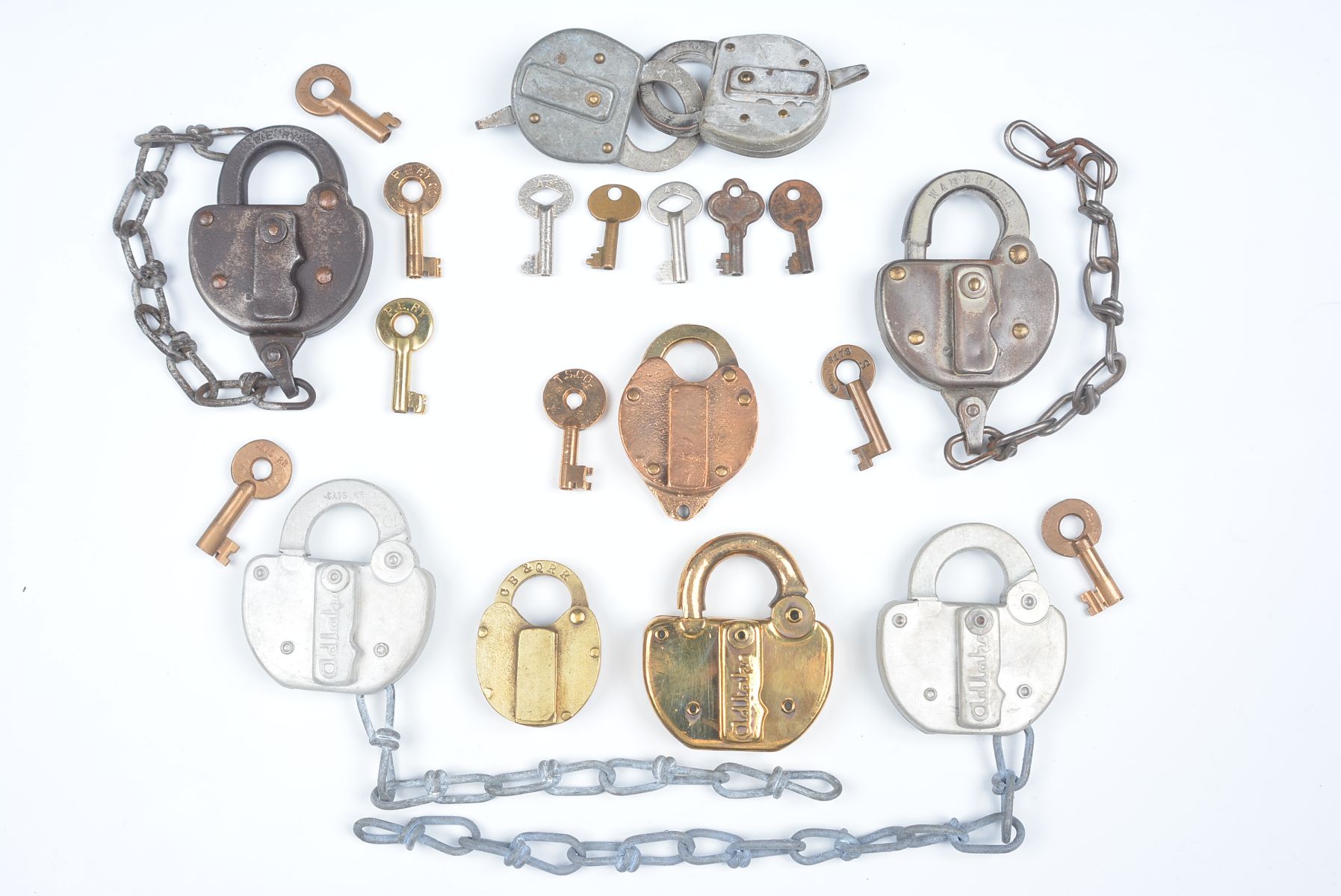 A COLLECTION OF PADLOCKS WITH RAILROAD MARKINGS