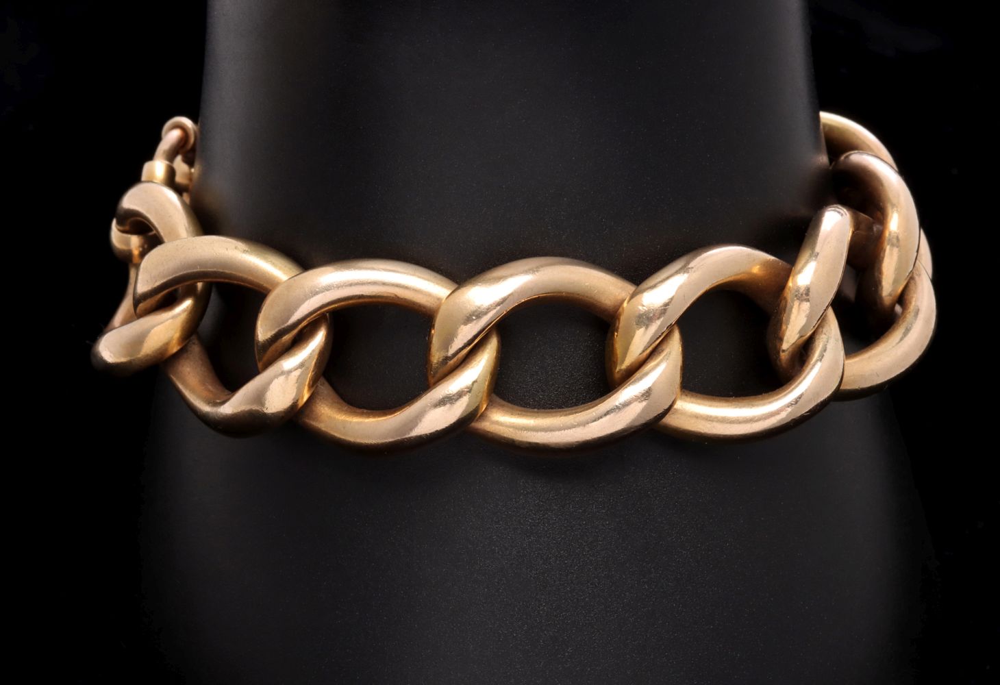 A HEAVY 14K GOLD LINK BRACELET SIGNED HARRY S. BICK