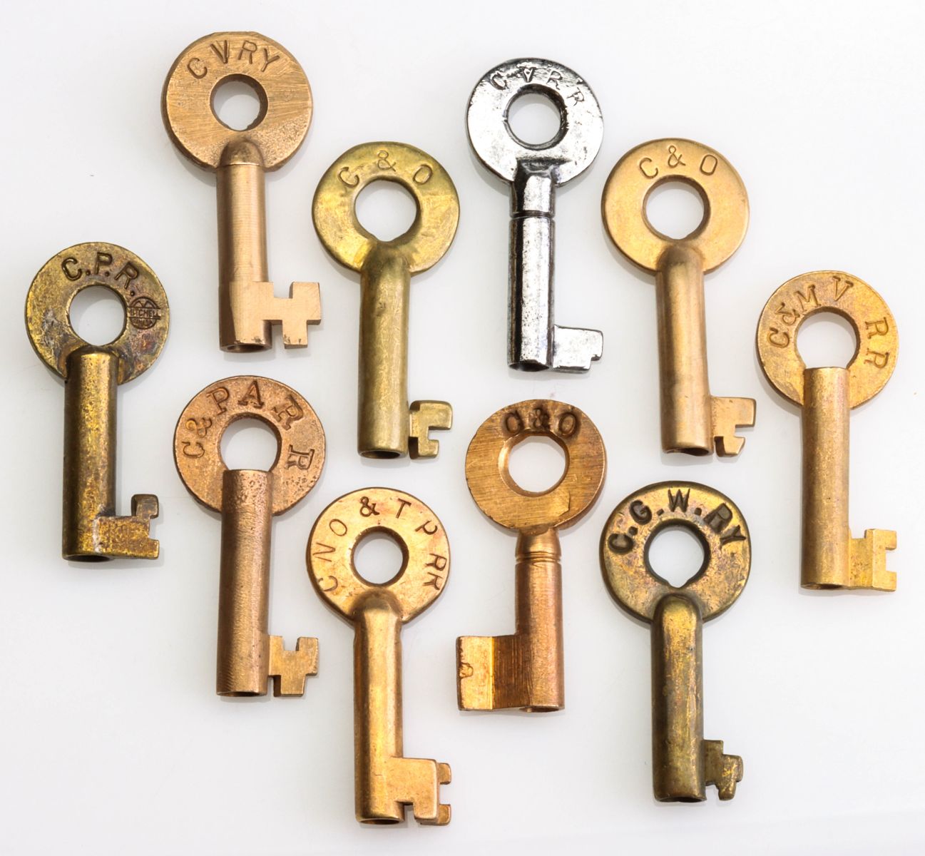 A COLLECTION OF SWITCH KEYS WITH RAILROAD MARKINGS