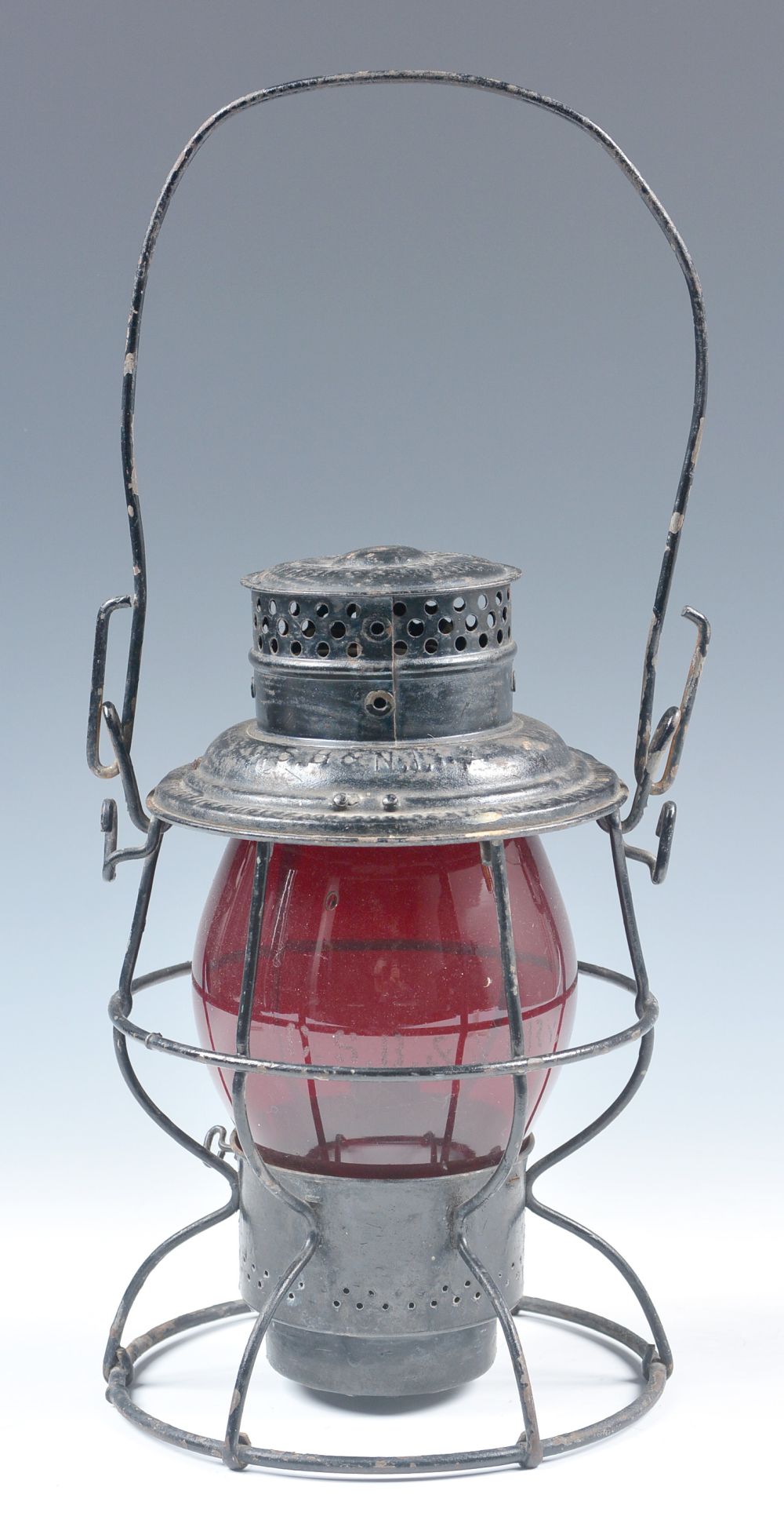 A TALL RED GLOBE RAILWAY LANTERN MARKED C.S.B.&N.I.