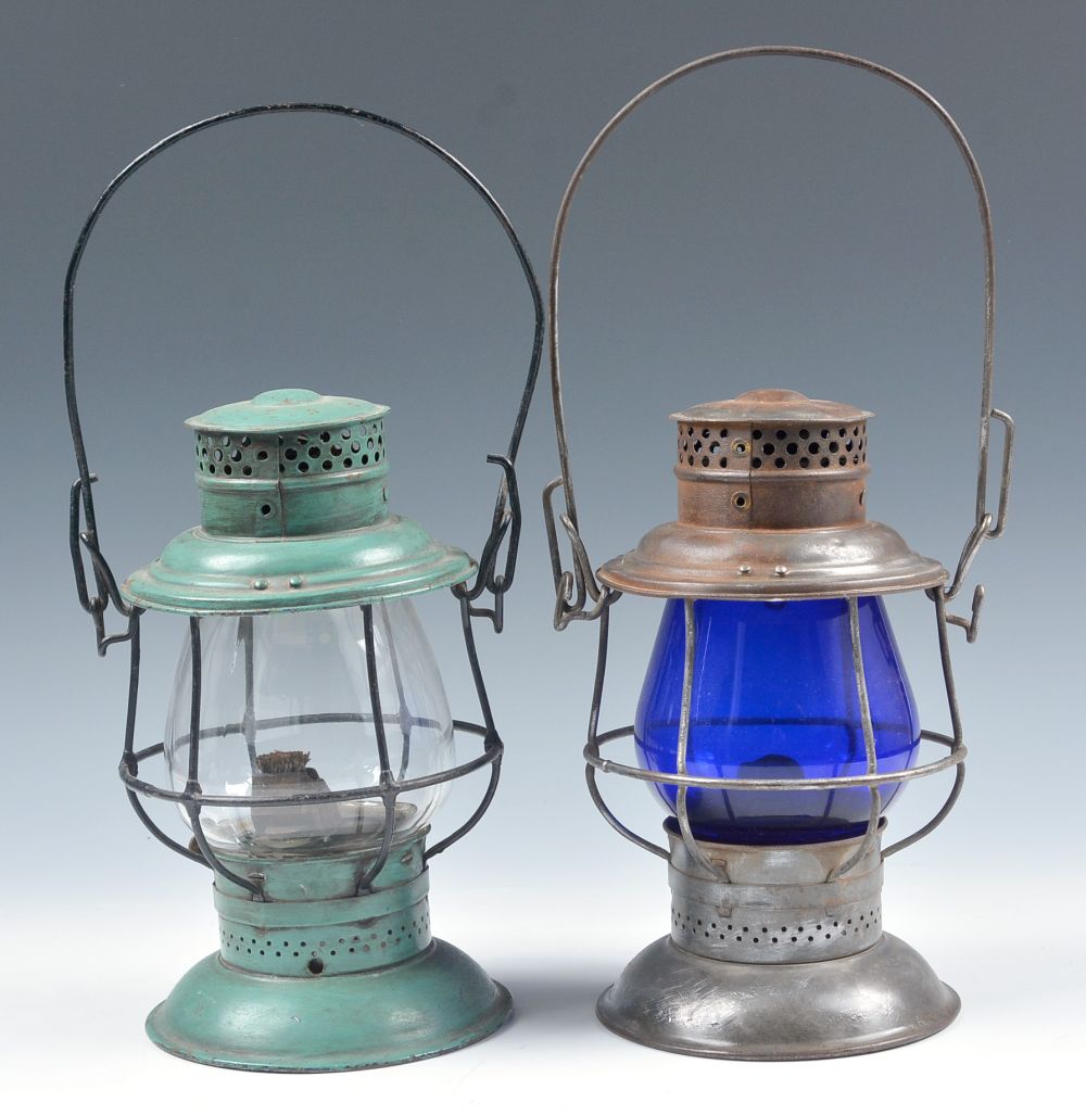 TWO TALL LANTERNS MARKED SANTA FE ON BELL BOTTOM FRAMES