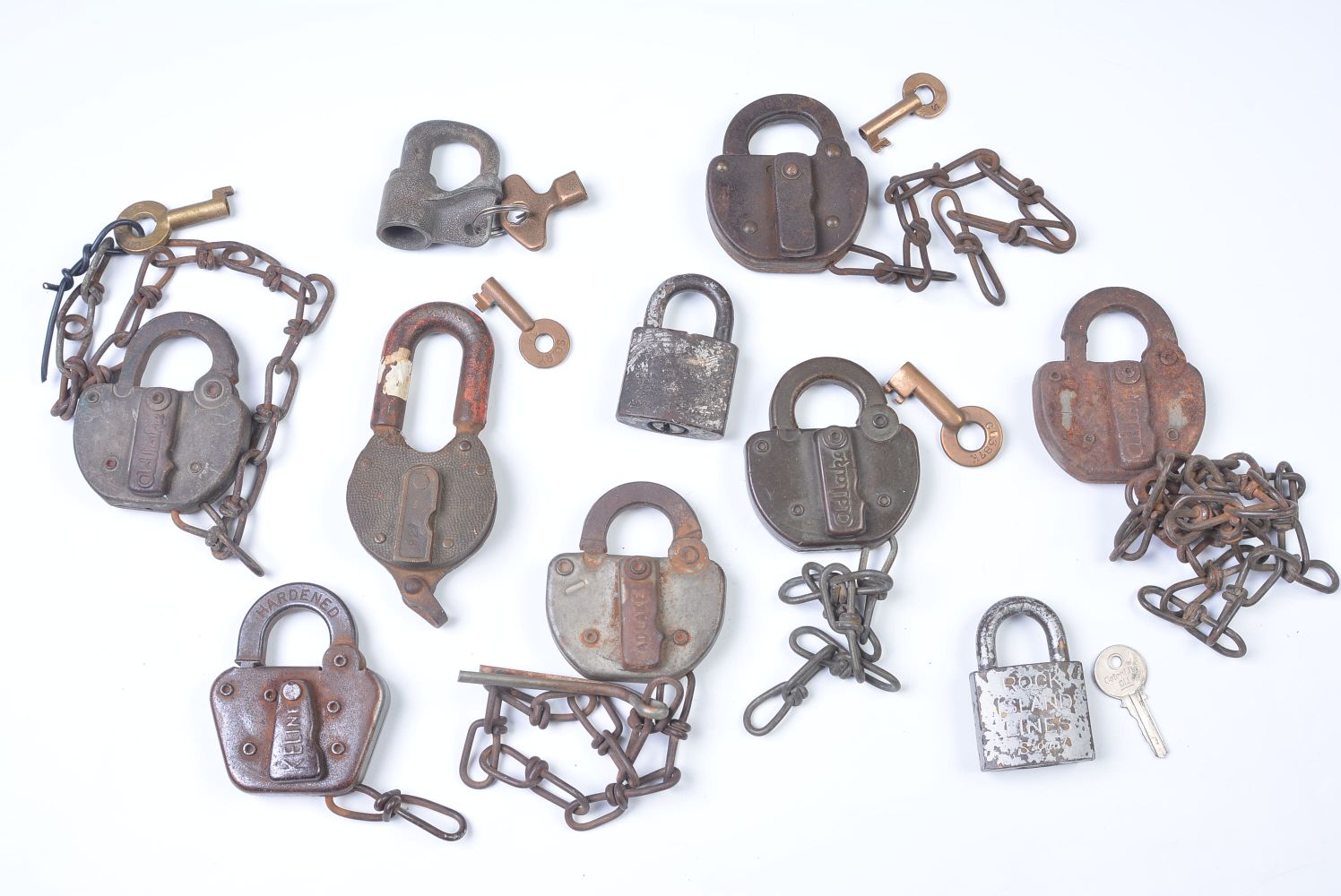 A COLLECTION OF PADLOCKS WITH RAILROAD MARKINGS