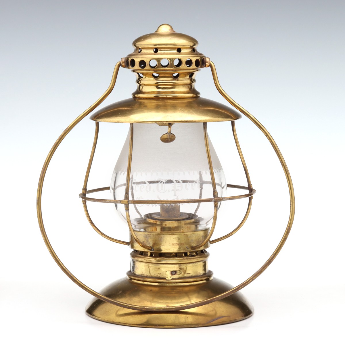 A FINE BRASS PRESENTATION LANTERN WITH ENGRAVED GLOBE