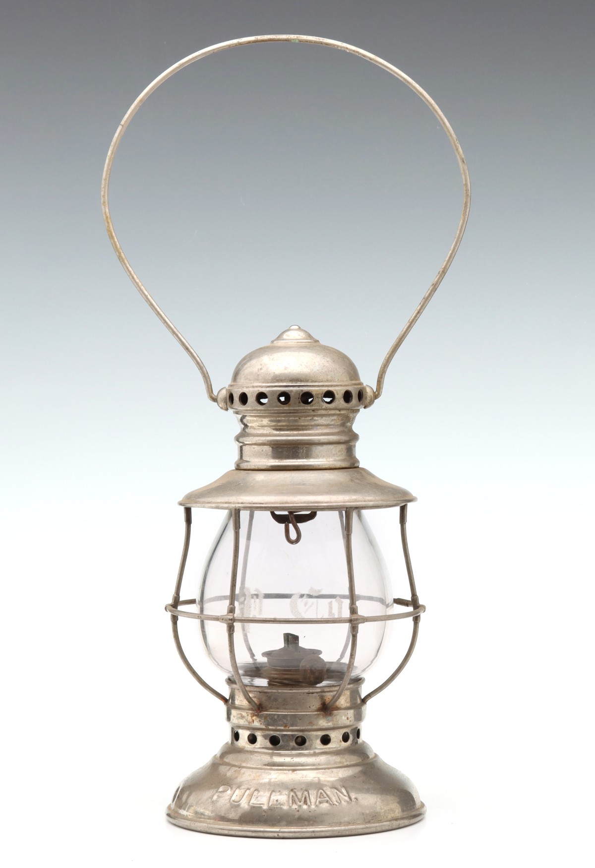 A PULLMAN PRESENTATION LANTERN WITH ETCHED GLOBE