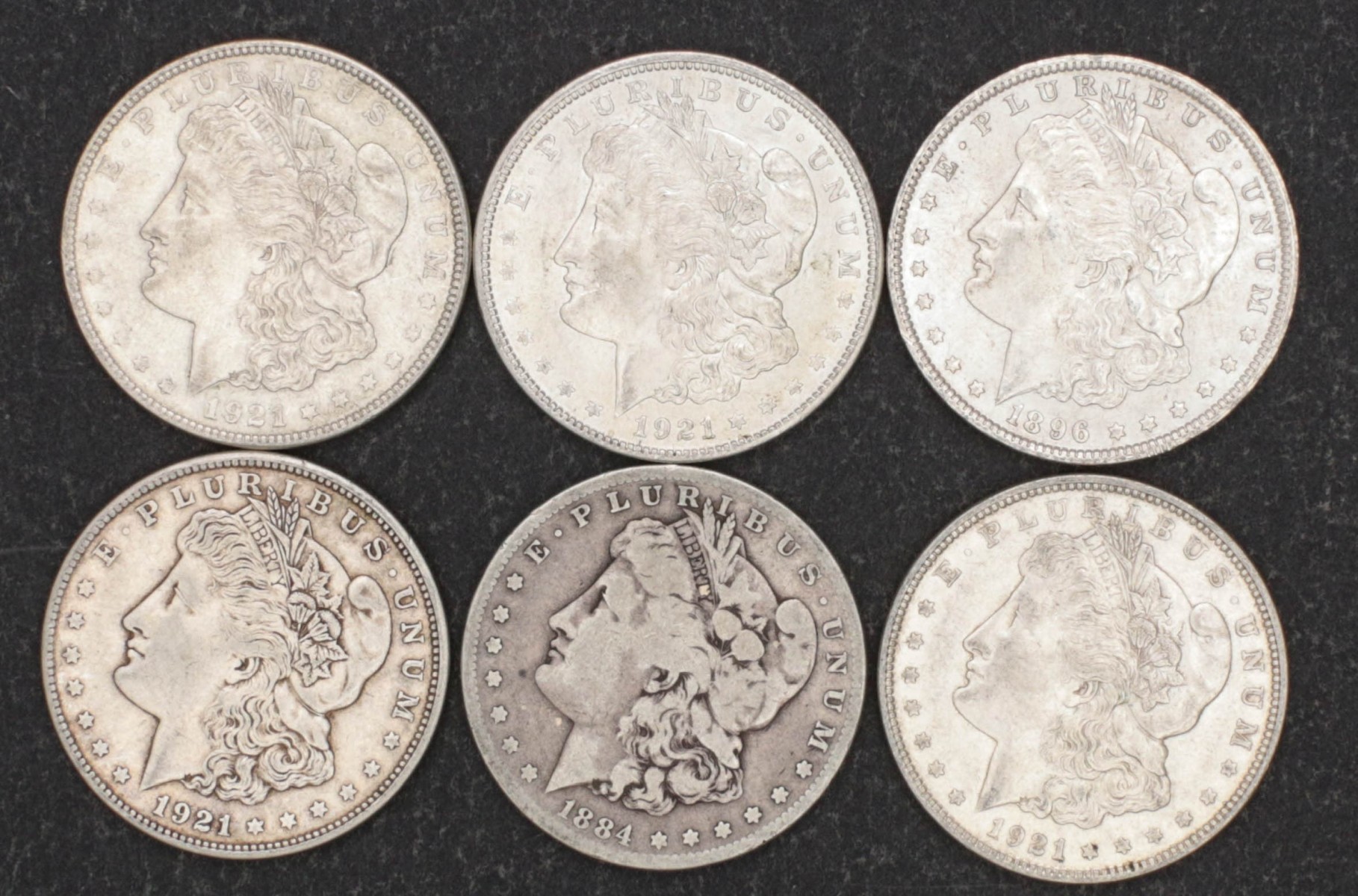 SIX MORGAN DOLLARS