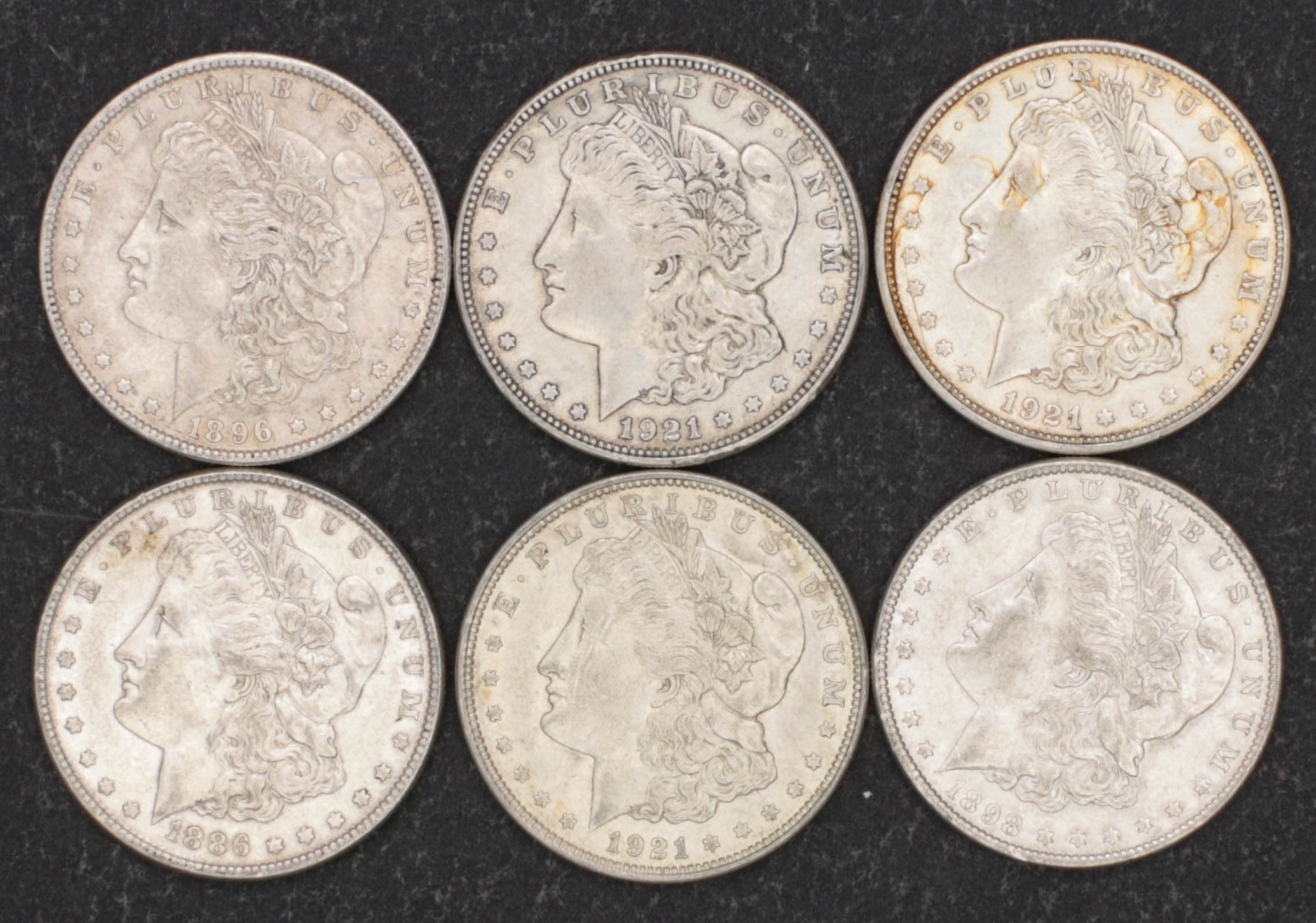 SIX MORGAN DOLLARS