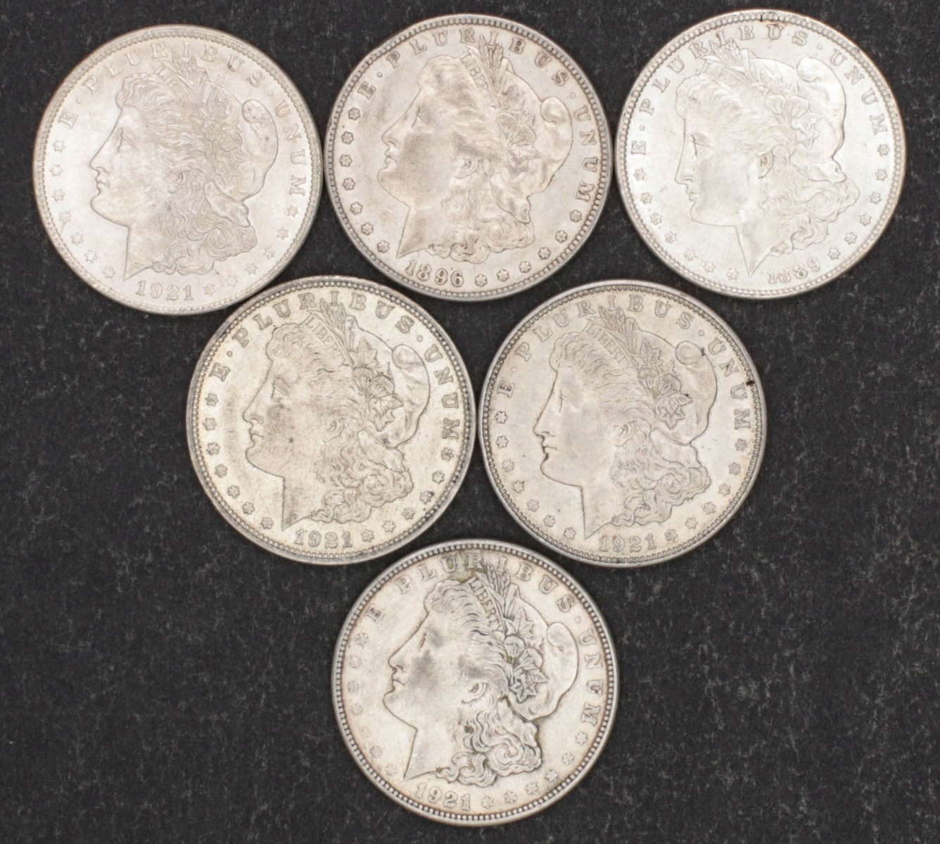 SIX MORGAN DOLLARS