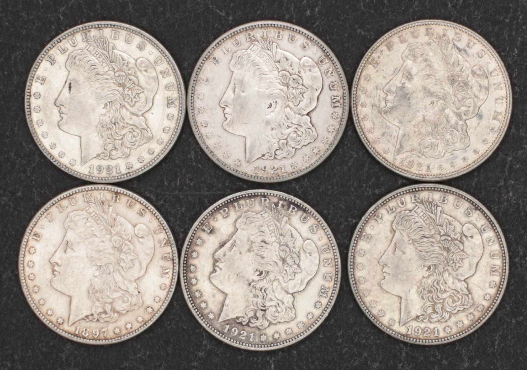 SIX MORGAN DOLLARS