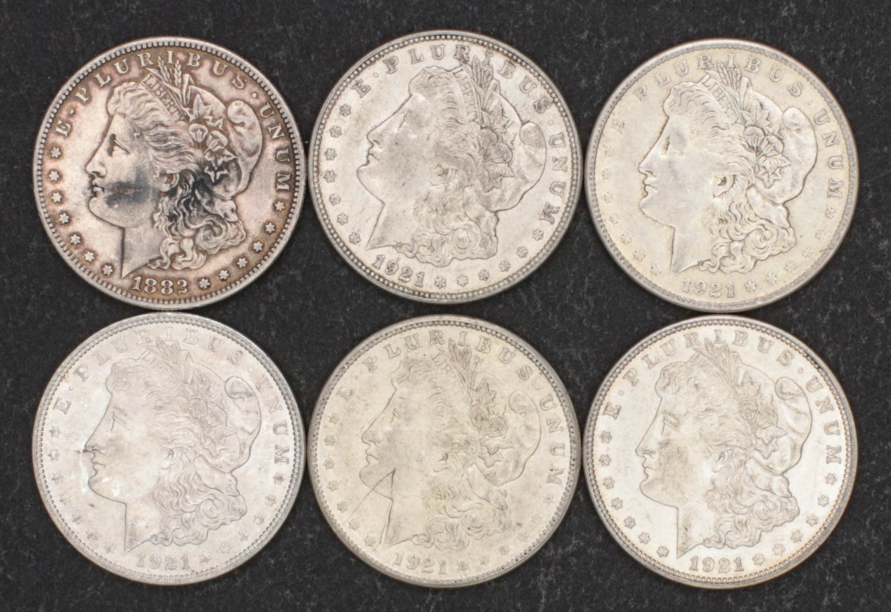 SIX MORGAN DOLLARS