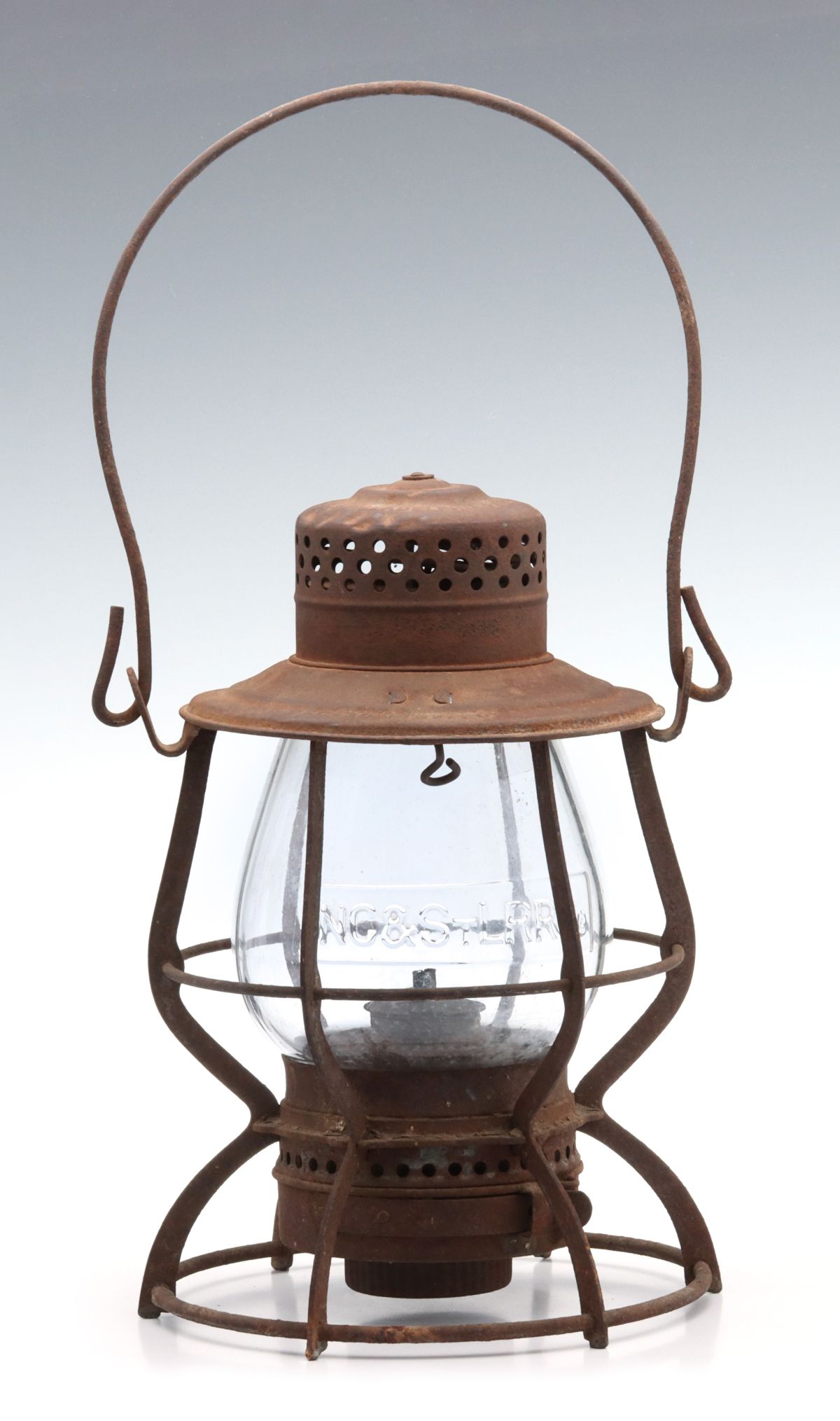 A TALL GLOBE RAILROAD LANTERN MARKED NC&STLRRCo