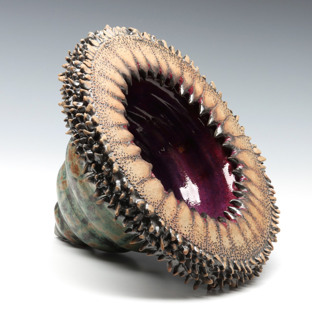 A STUDIO POTTERY SCULPTURE RESEMBLING AN ANEMONE
