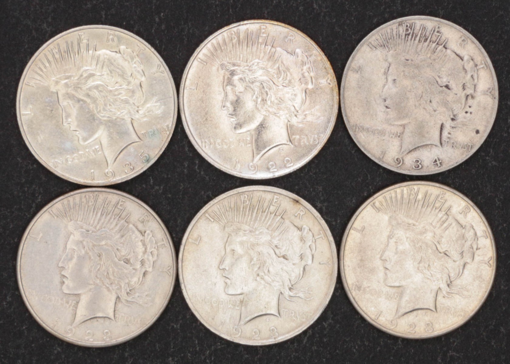 SIX PEACE DOLLARS