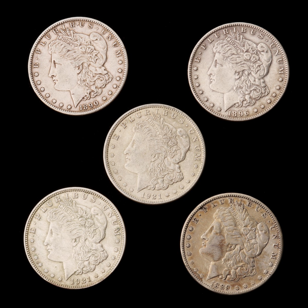 FIVE MORGAN DOLLARS