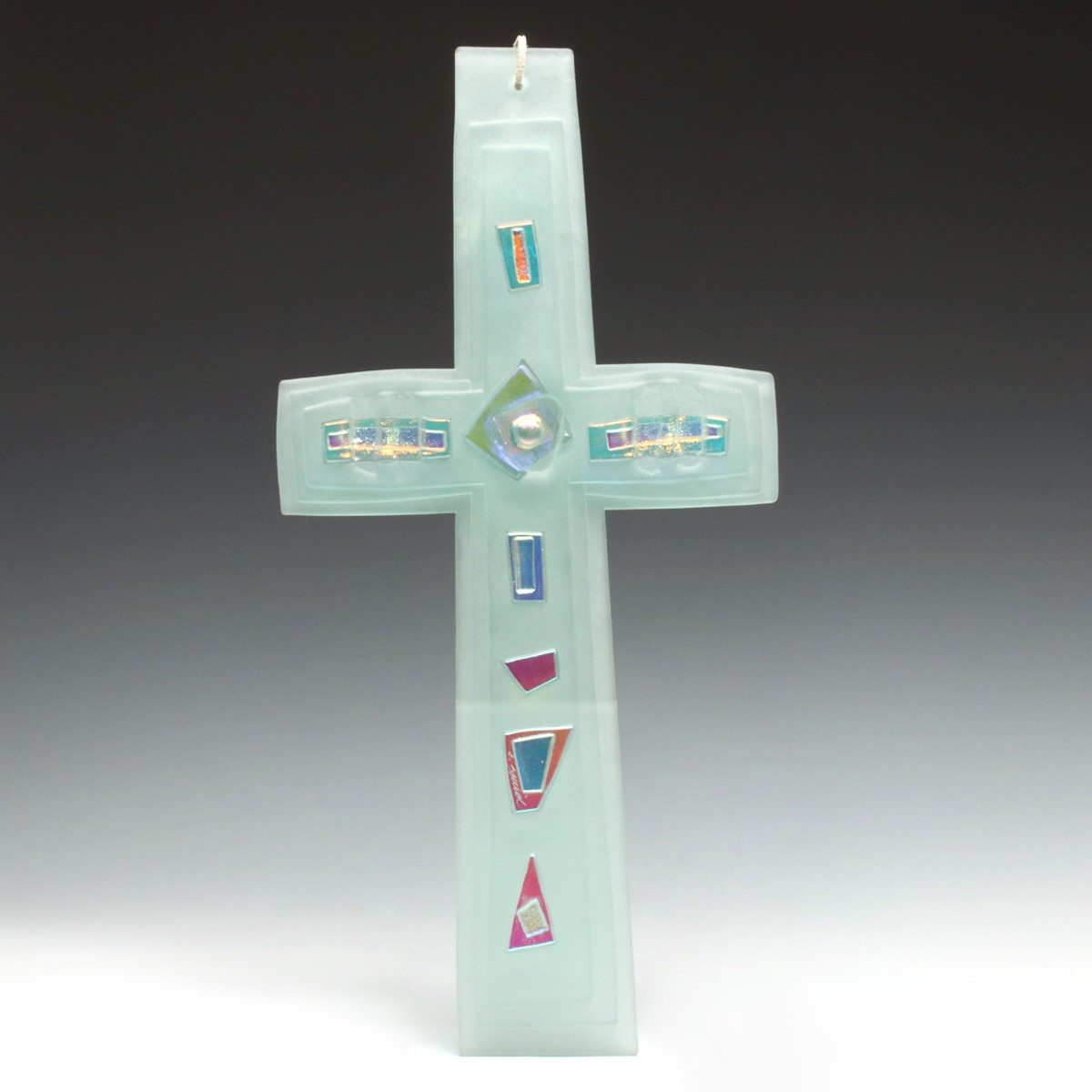 CAROL SAVID (20th/21st C.) FUSED GLASS CHRISTIAN CROSS