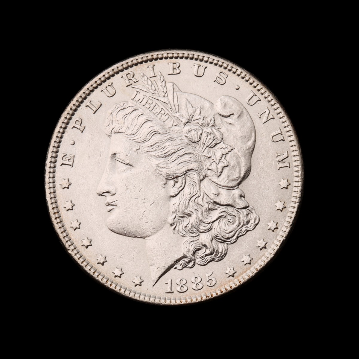 A HIGH GRADE 1885 MORGAN SILVER DOLLAR