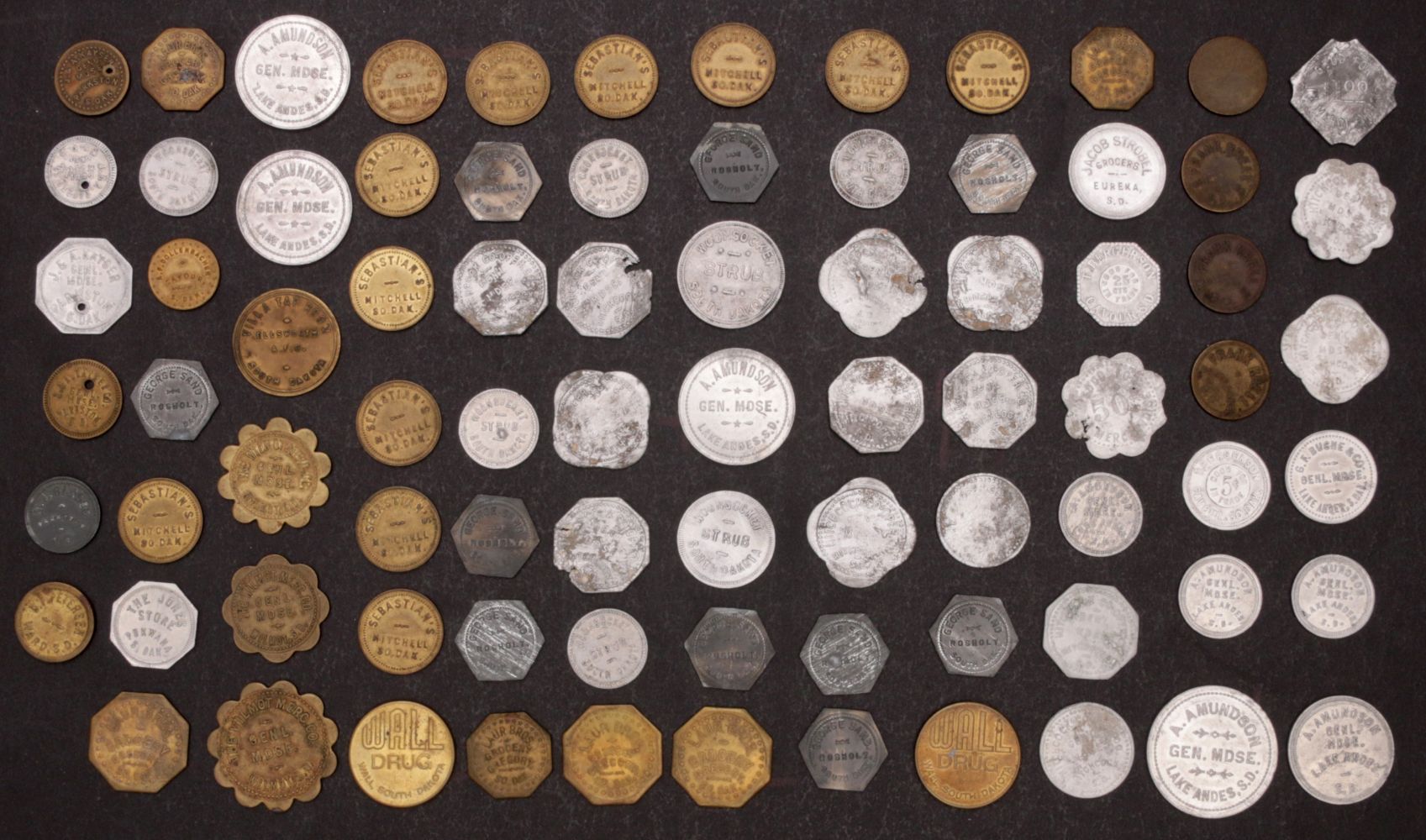 A COLLECTION OF 81 VARIOUS SOUTH DAKOTA TOKENS