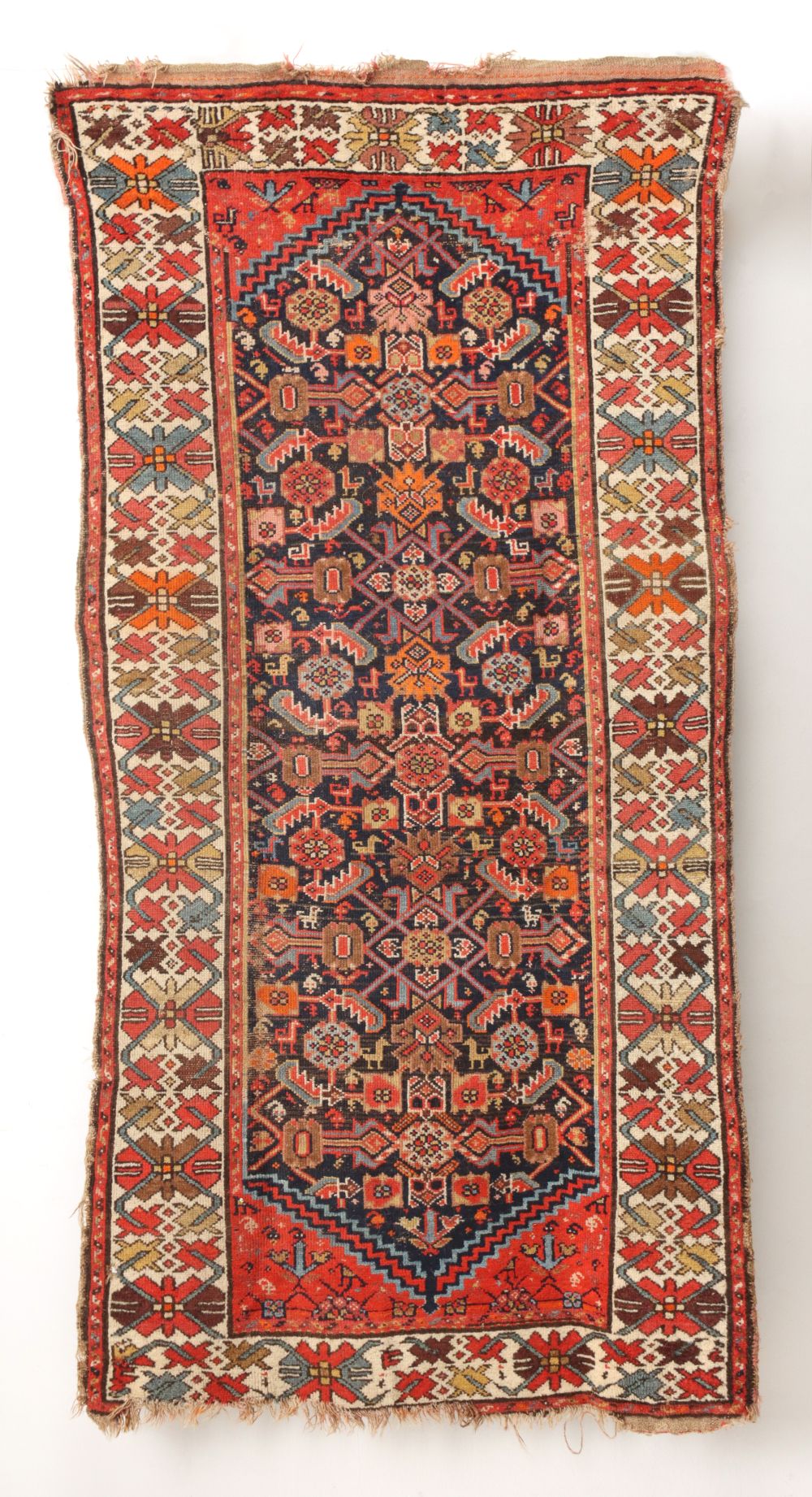 A HAND MADE NORTHWEST PERSIAN KURDISH RUG CIRCA 1890