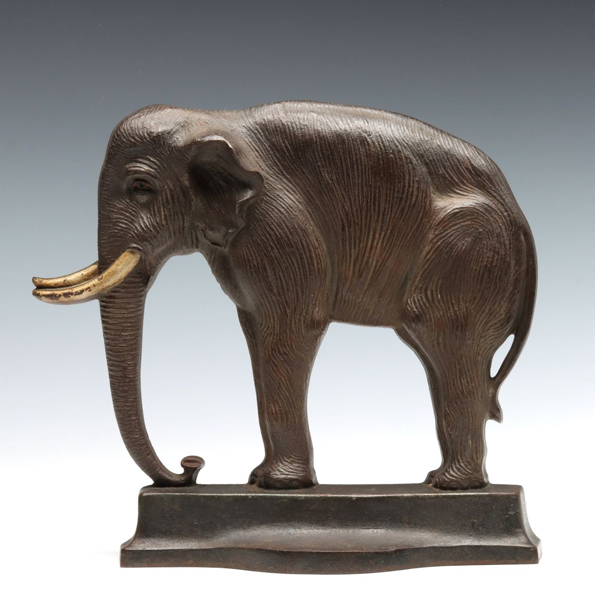 A FINELY DETAILED BRADLEY HUBBARD ELEPHANT DOORSTOP