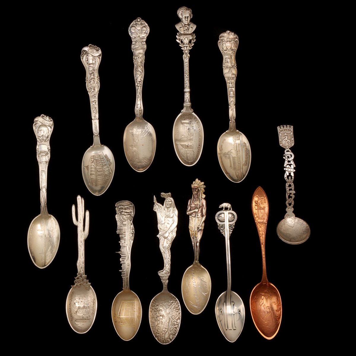 ELEVEN STERLING SILVER SOUVENIR SPOONS