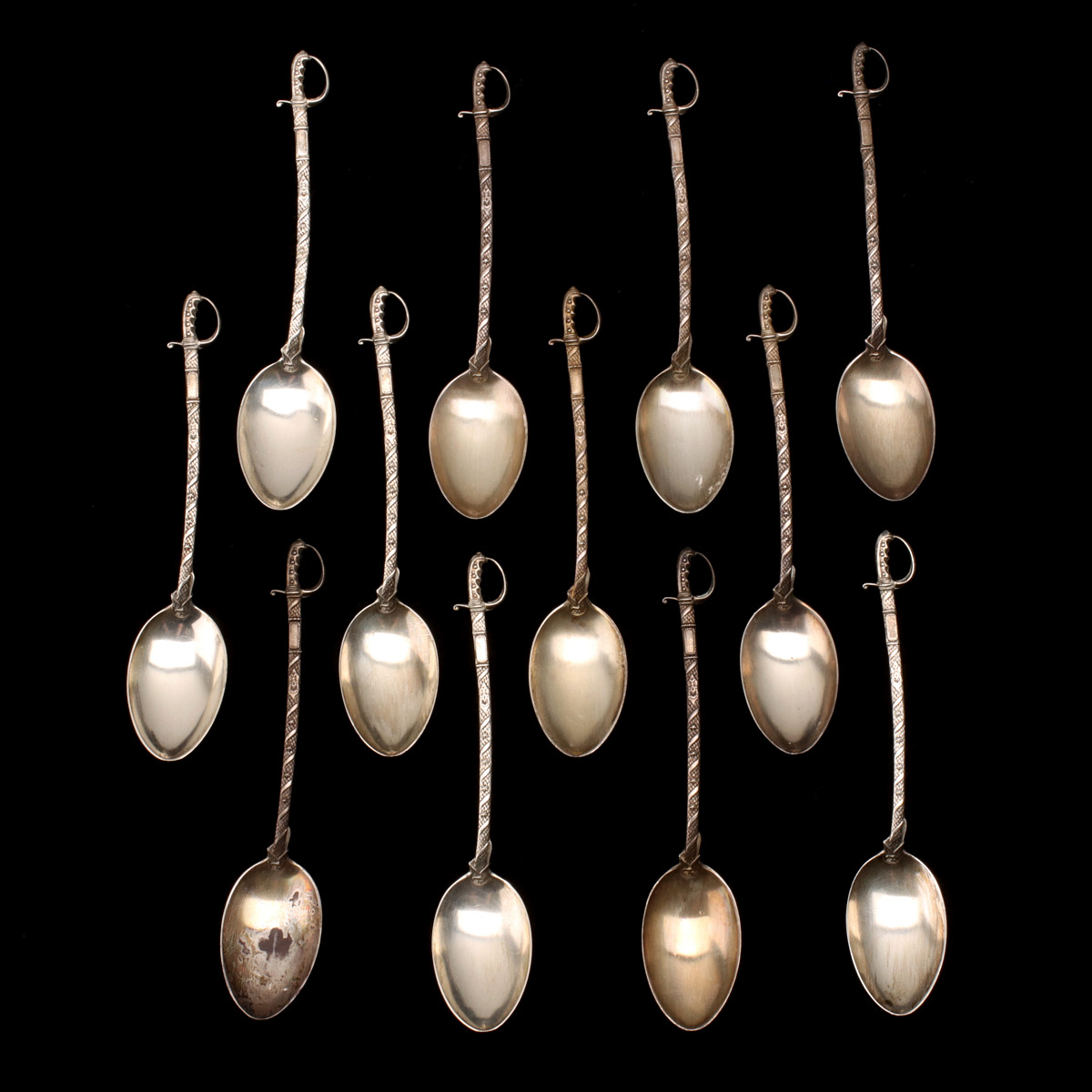 TWELVE STERLING SILVER SABRE HANDLE TEASPOONS