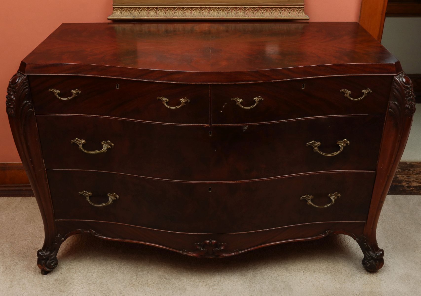 AN EDWARDIAN BOMBE' FORM MAHOGANY CHEST