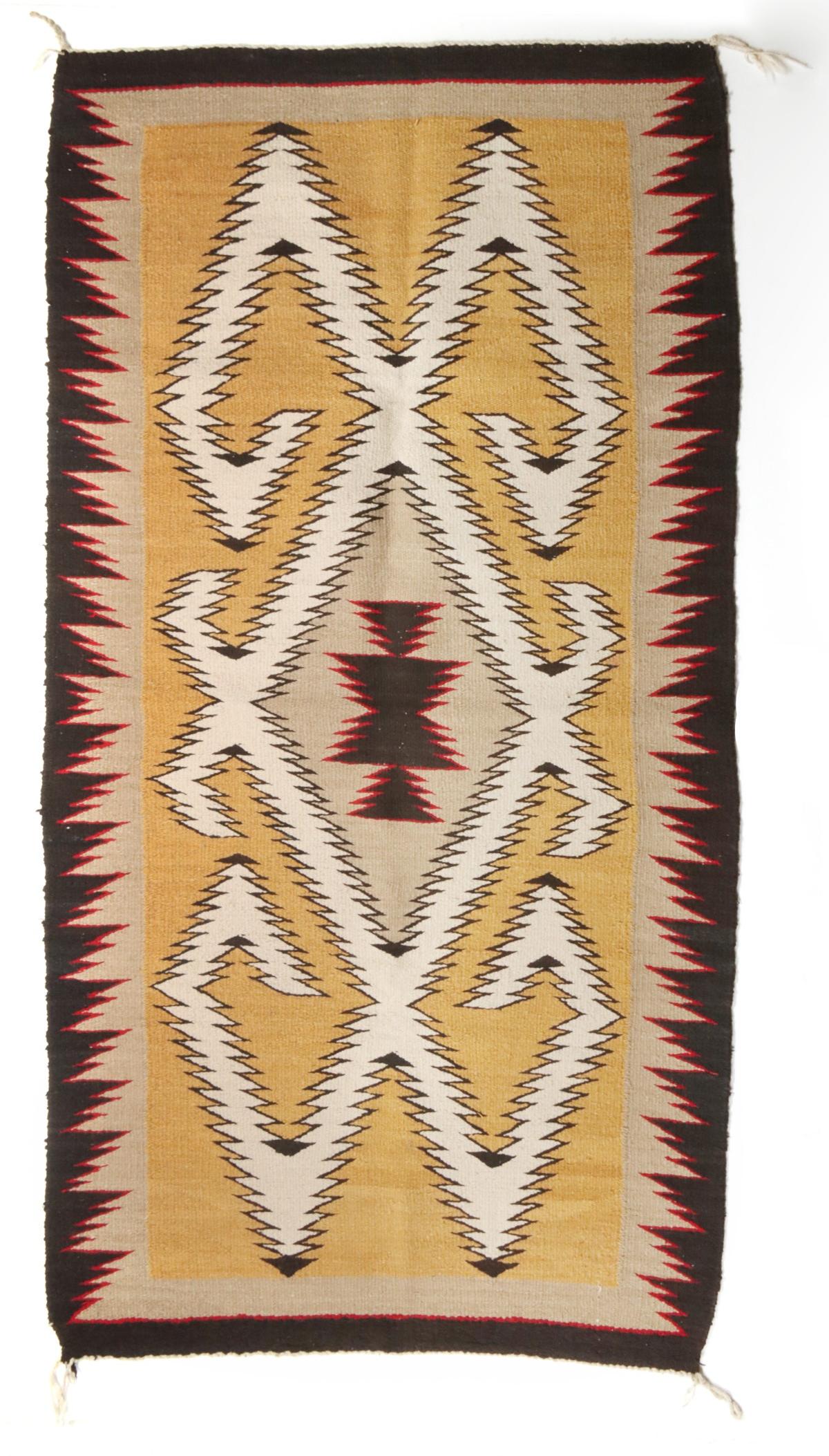 A GOOD CRYSTAL TRADING POST NAVAJO RUG