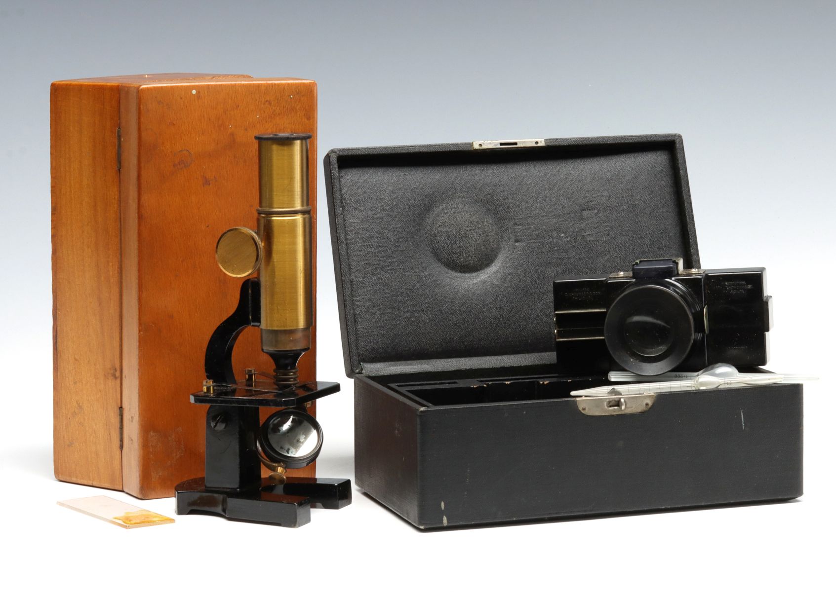 A 19TH C. FRENCH BRASS TUBE HORSESHOE BASE MICROSCOPE