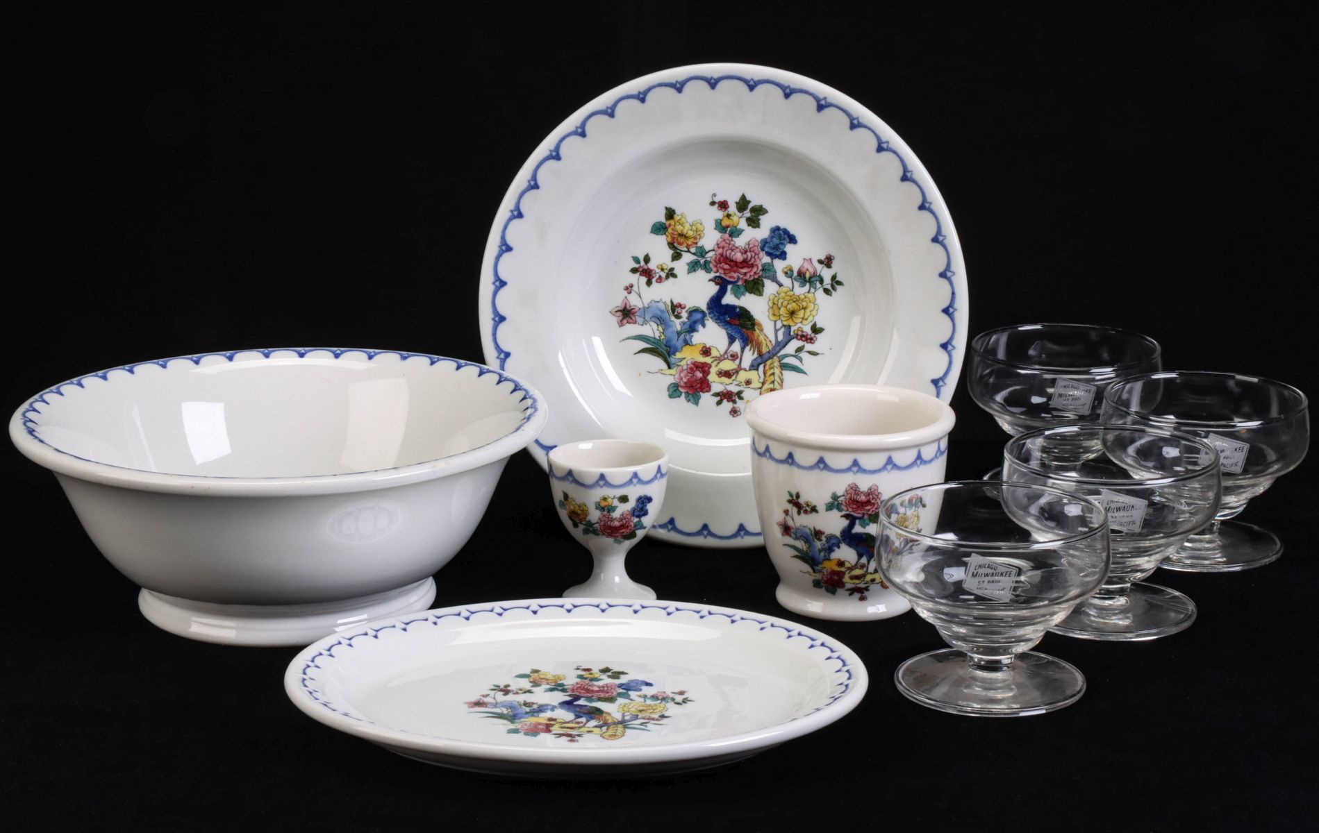 A SET OF C.M.St.P.&P. 'PEACOCK' PATTERN RAILROAD CHINA