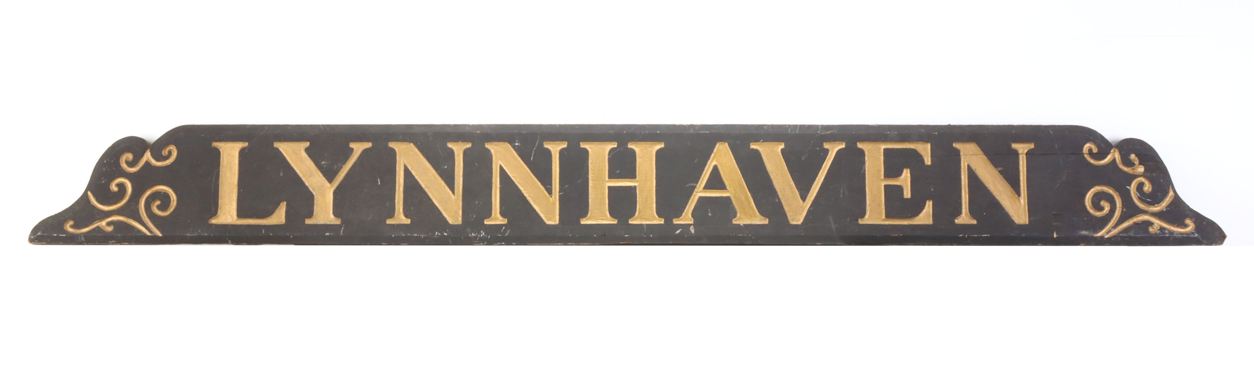 A CARVED AND GILDED WOOD SIGN LETTERED LYNNHAVEN