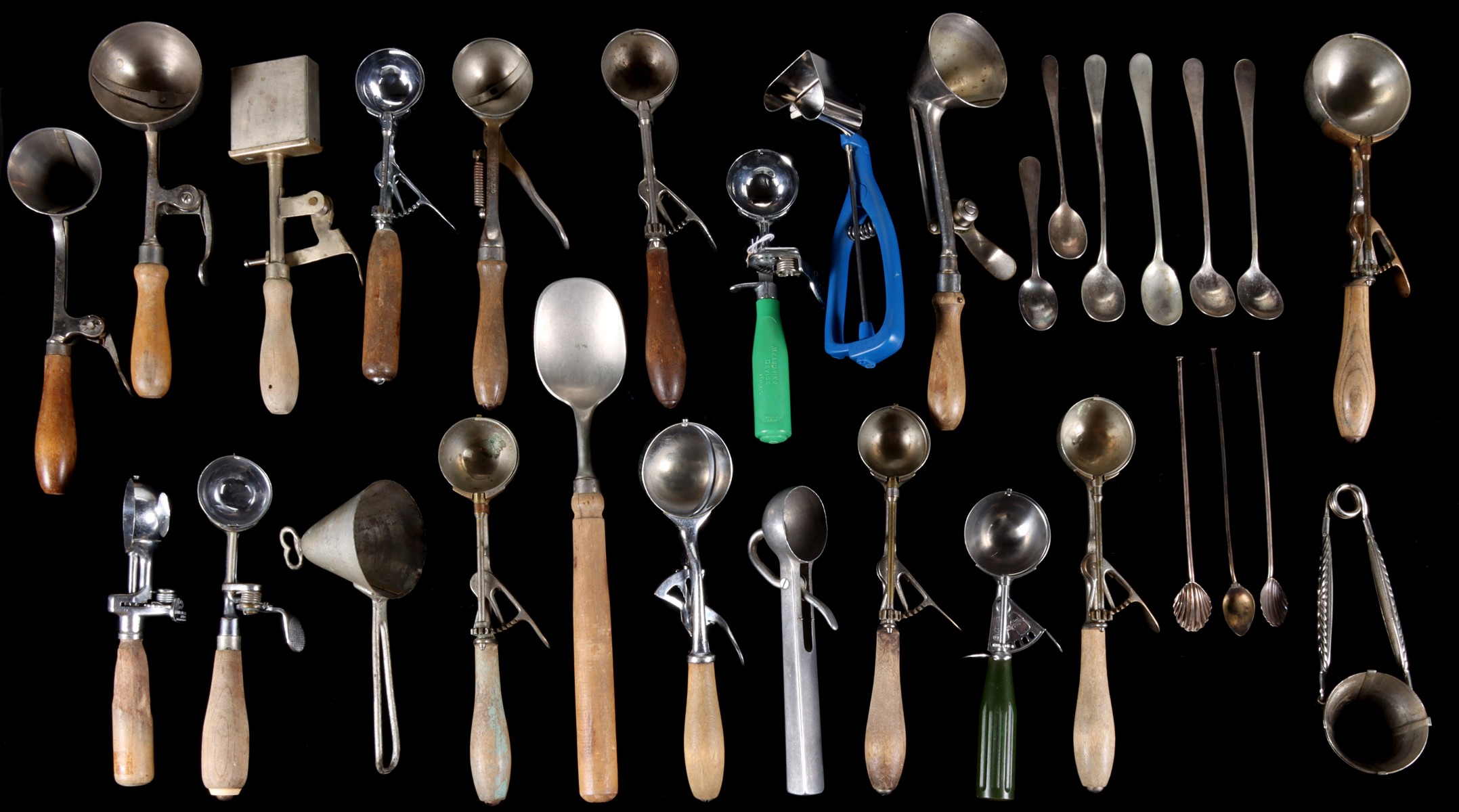 A COLLECTION OF TWENTY ANTIQUE ICE CREAM SCOOPS