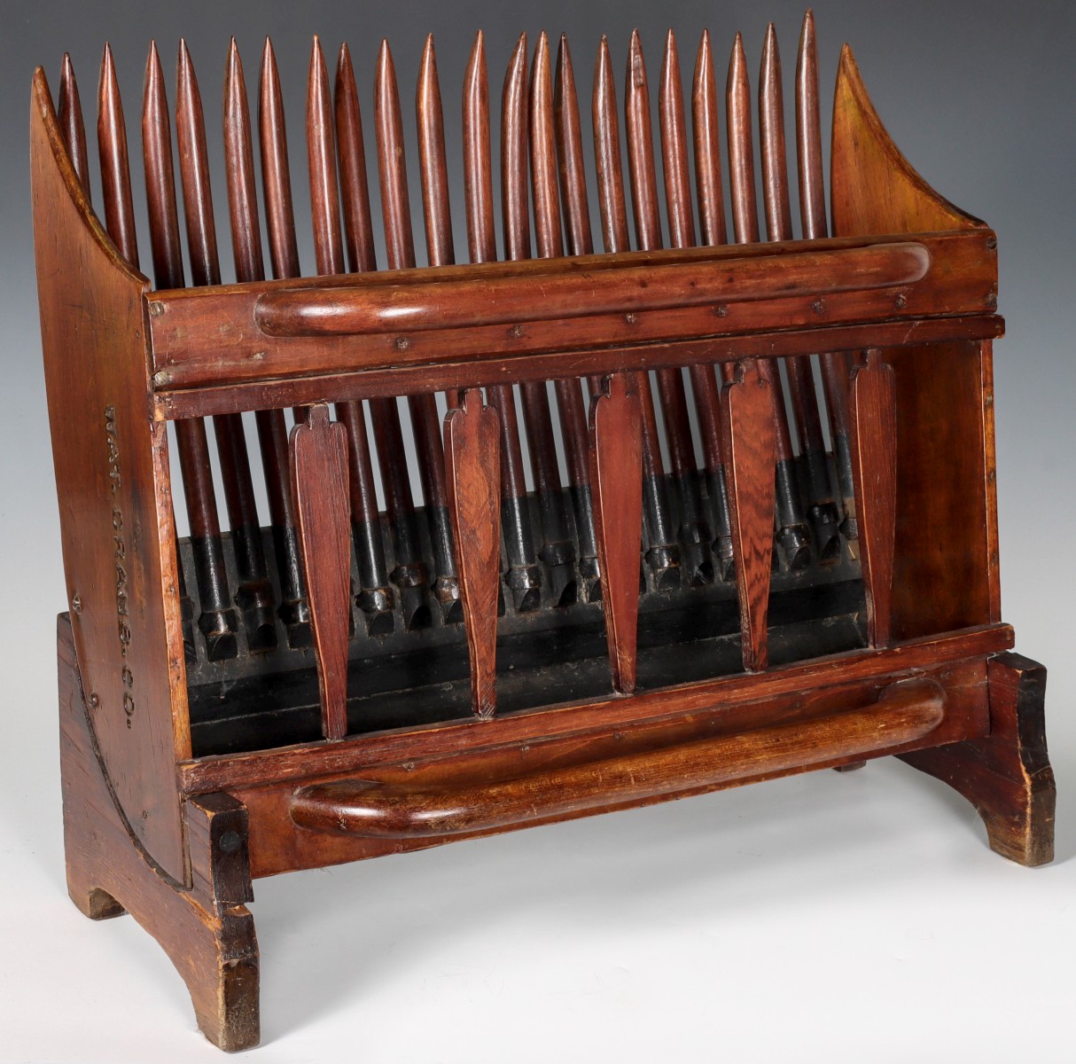 A 19TH C. AMERICAN CRANBERRY PICKER AS MAGAZINE RACK