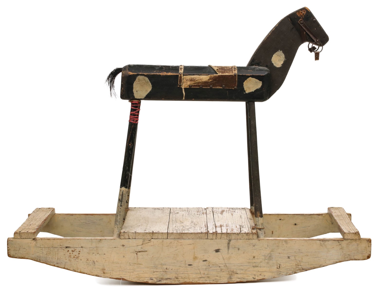 A PRIMITIVE FOLK ART ROCKING HORSE CIRCA 1900