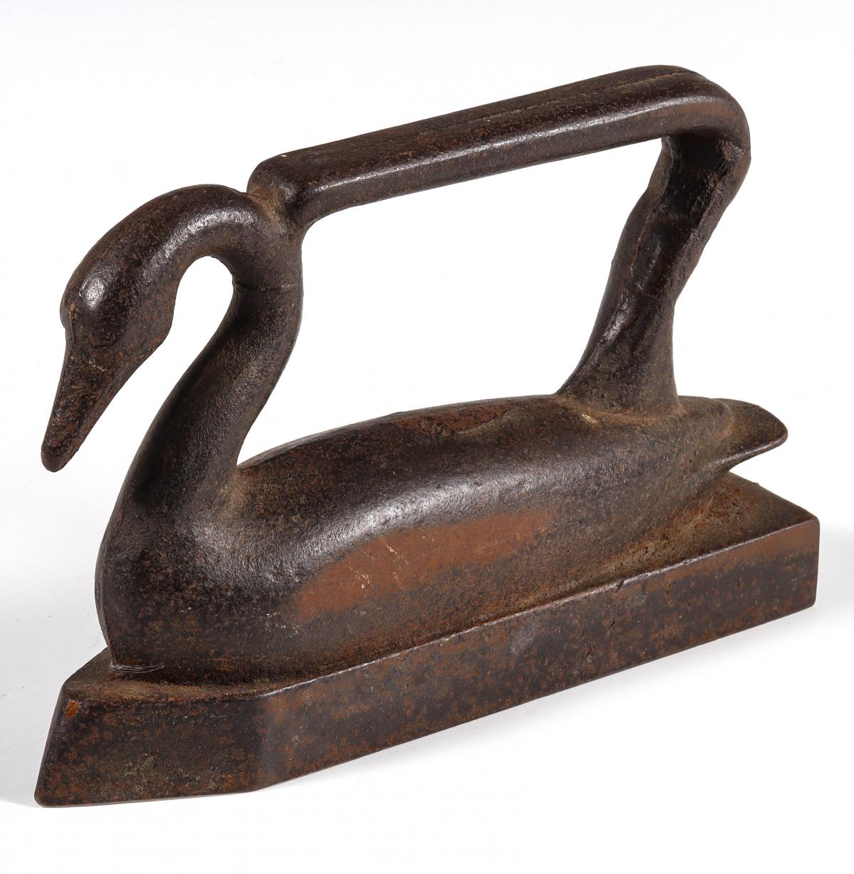 A RARE 19TH C. FIGURAL SWAN SAD IRON