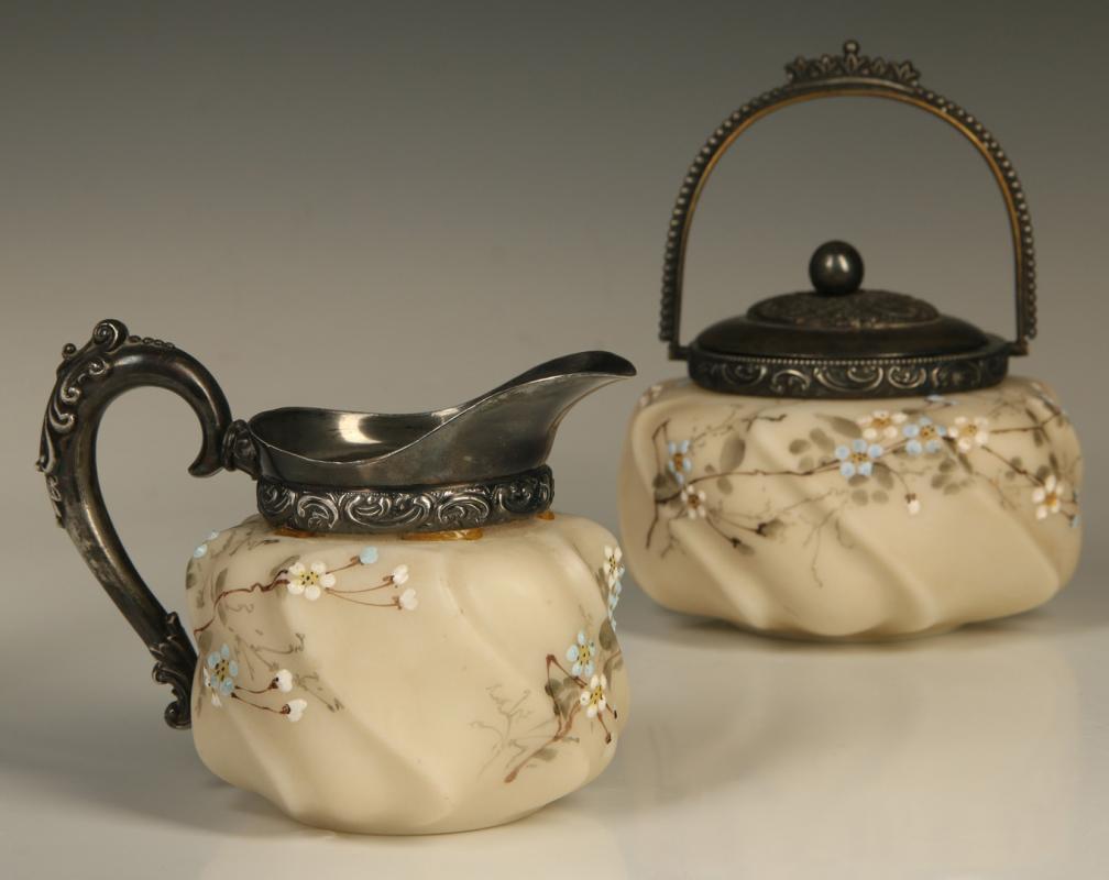 A WAVECREST METAL MOUNTED CREAM AND SUGAR SET
