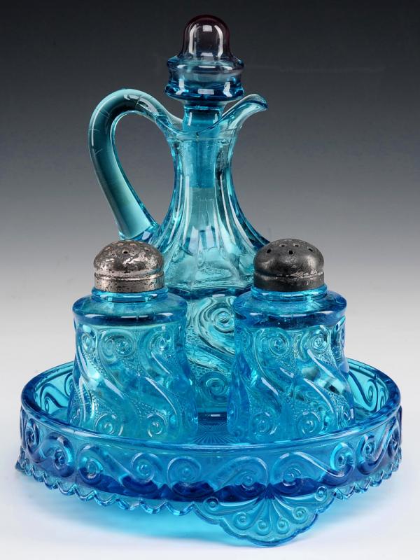 A RARE DUGAN ICE BLUE 'S REPEAT' PATTERN CRUET CASTOR SET