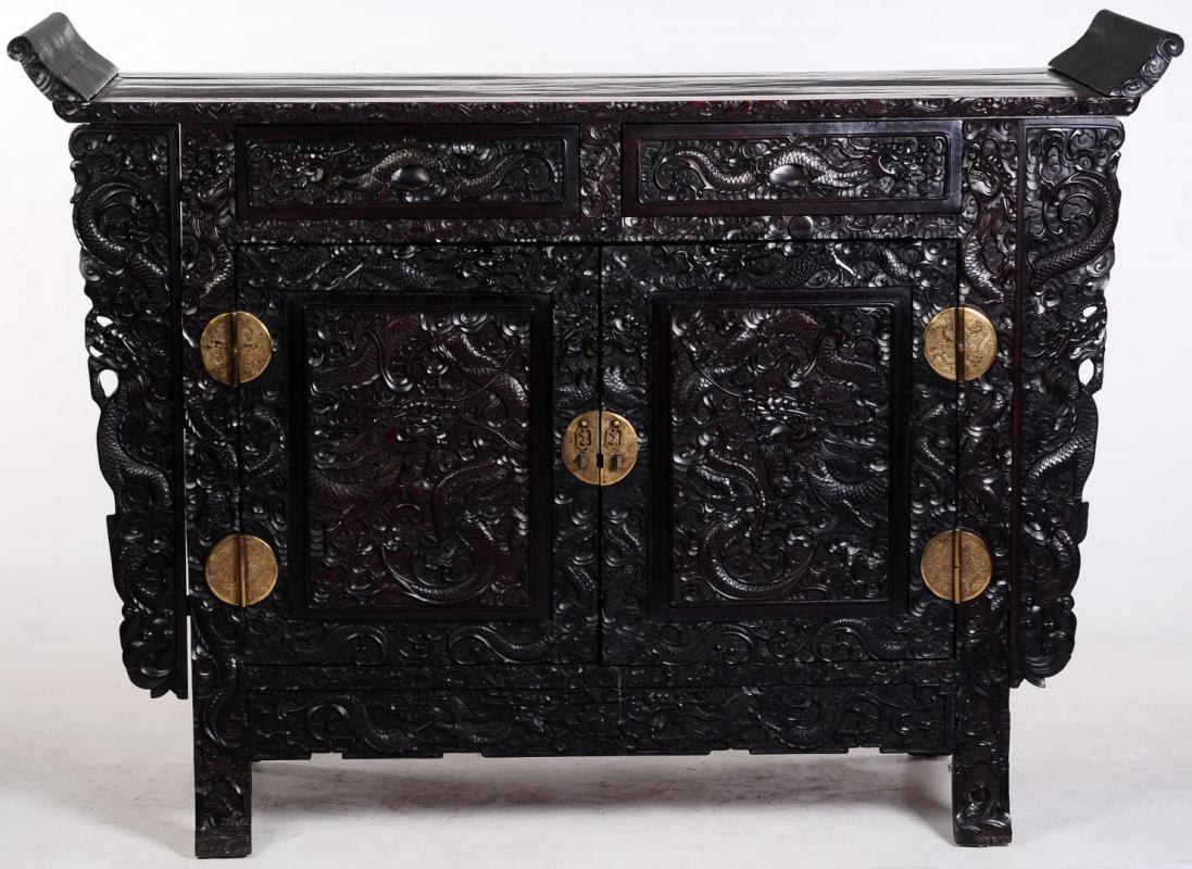 A LARGE HEAVILY CARVED CHINESE ZITAN ALTAR COFFER