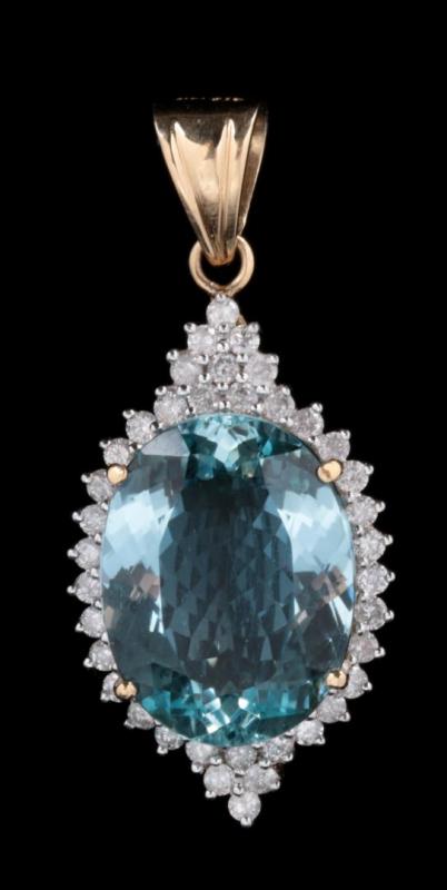 A 14K GOLD AQUAMARINE PENDANT WITH DIAMONDS 