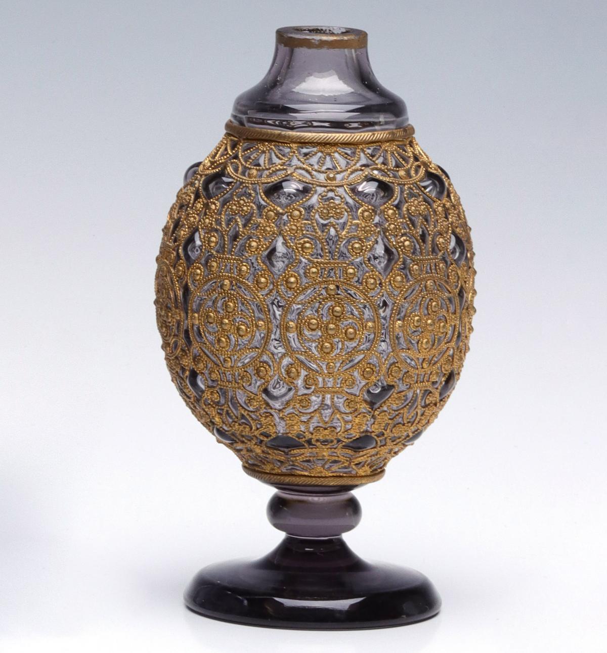 AN UNUSUAL BLOWNOUT BOHEMIAN ART GLASS VASE