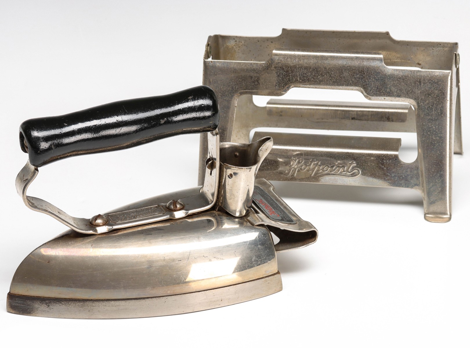 A DUAL PURPOSE HOTPOINT PRESSING IRON/HOT PLATE