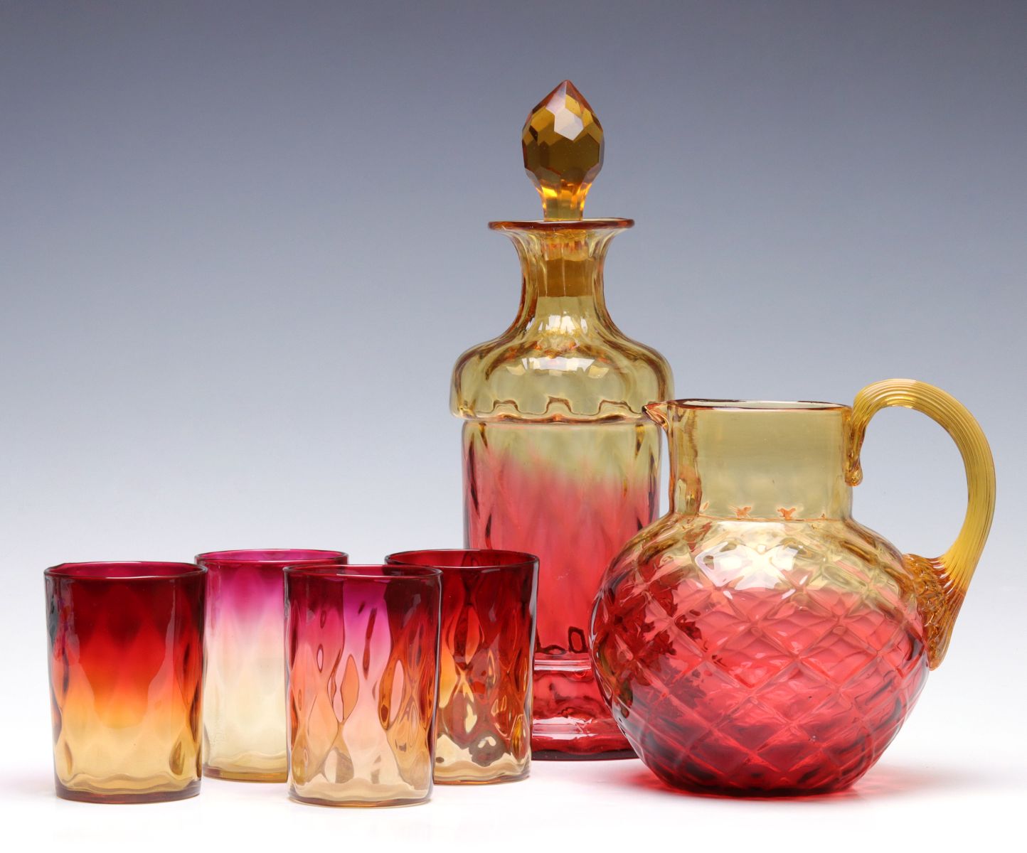 A COLLECTION OF AMBERINA ART GLASS TABLE WARES